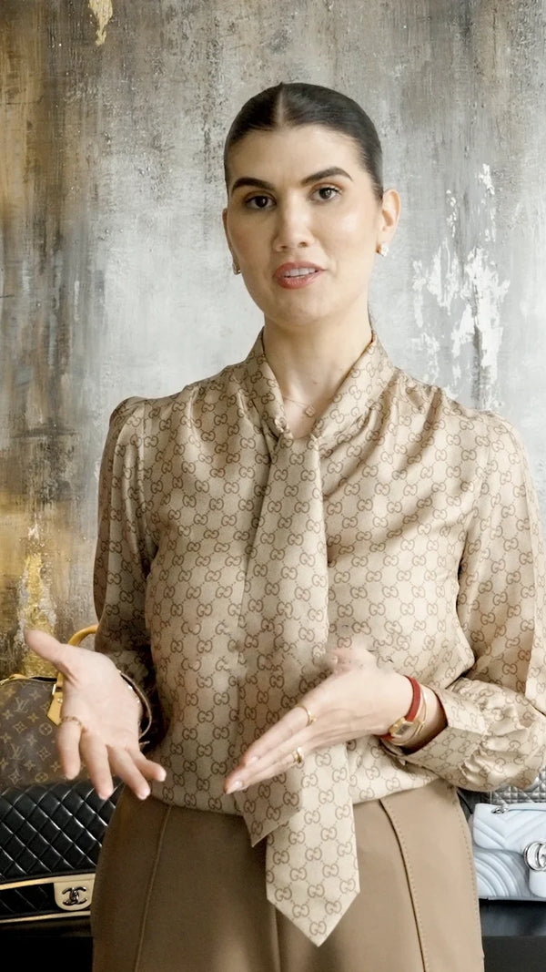 Eliza da EELLA CONCEPT com uma mala de luxo em destaque, thumbnail do episódio 22 de The Bag Affair sobre a escolha certa.