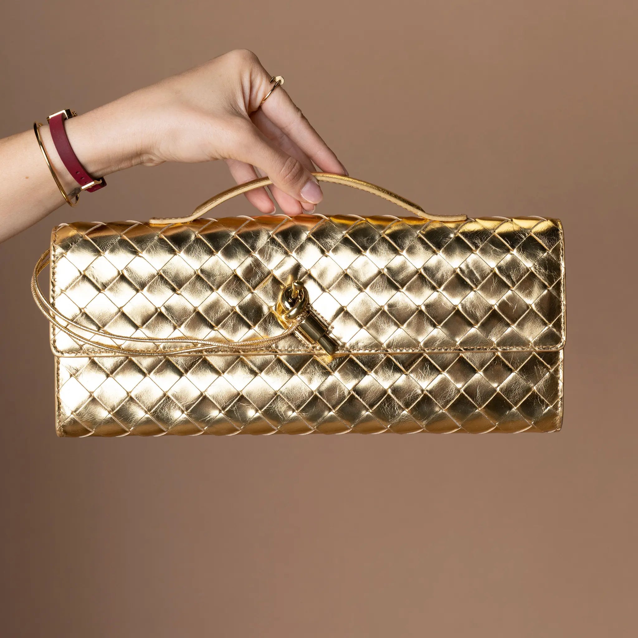 Bottega Veneta Metallic Lambskin Intrecciato Andiamo Clutch — Featured Image