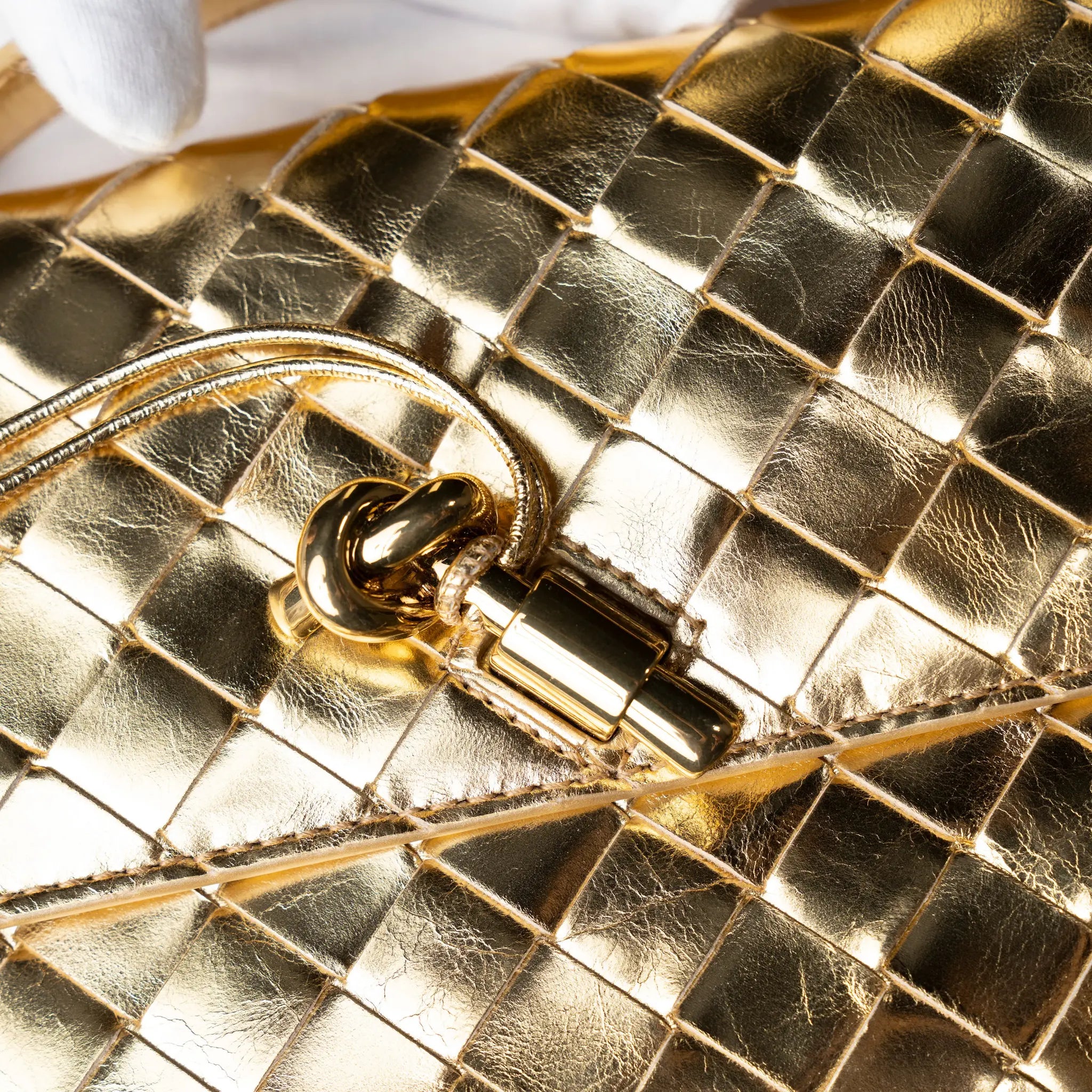 Bottega Veneta Metallic Lambskin Intrecciato Andiamo Clutch — Close-up Detail
