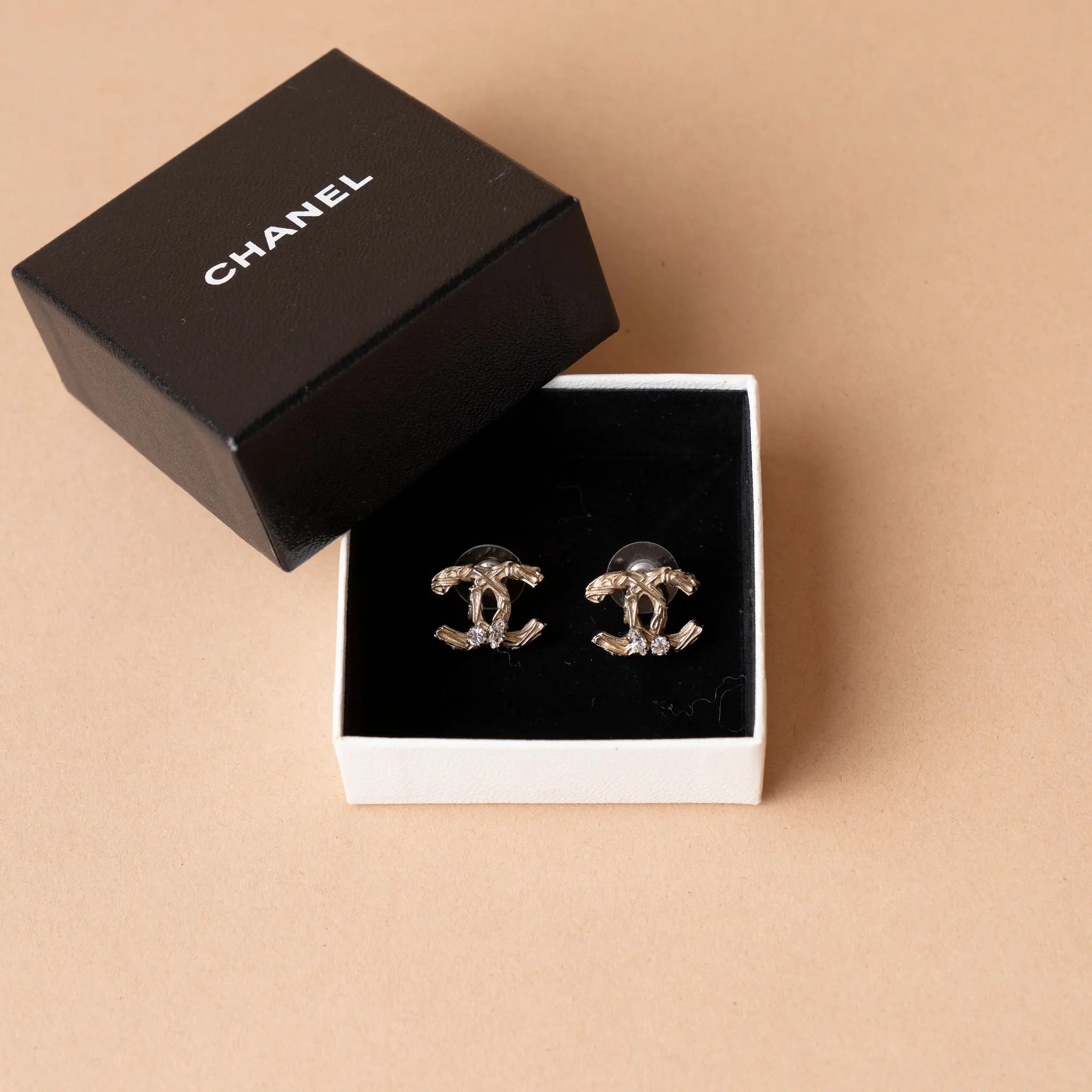 Chanel CC Brass and Strass Push Back Earrings — Front View