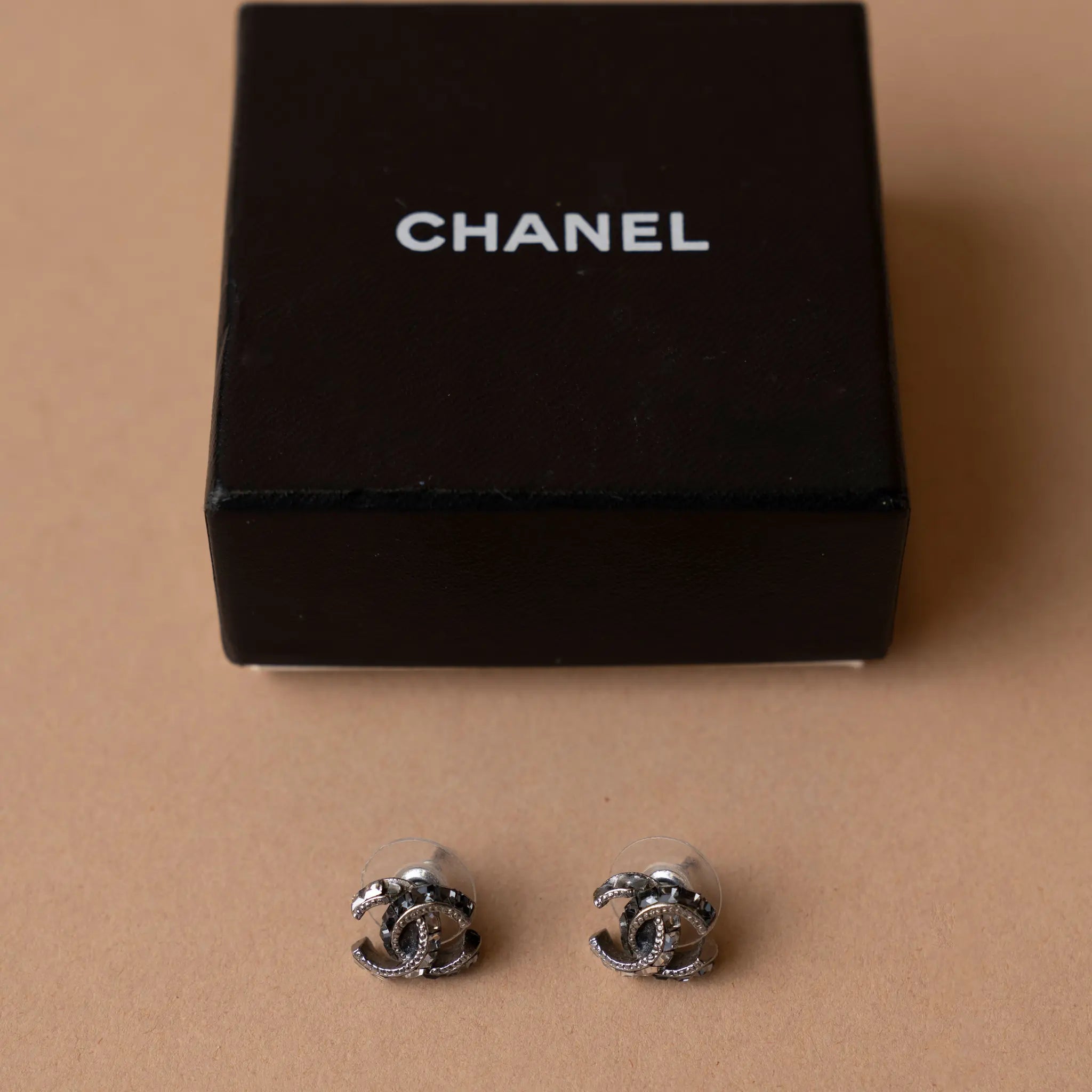 Chanel CC Brass and Strass Push Back Earrings — Front View