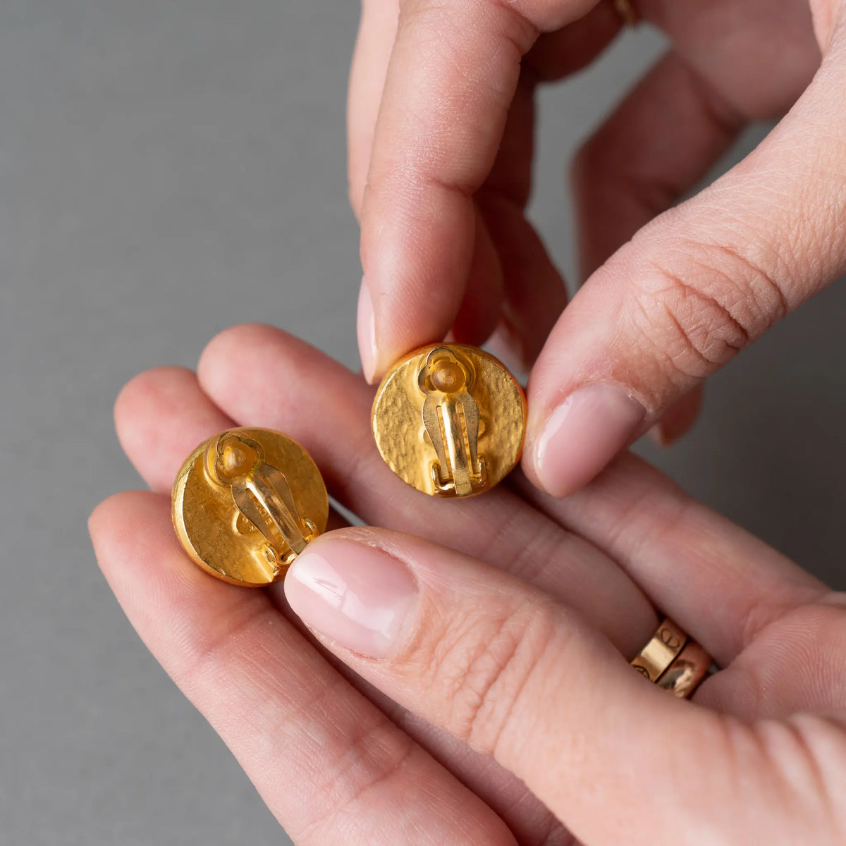 Chanel CC Gold Plated Enamel Round Button Clip On Earrings — Front View