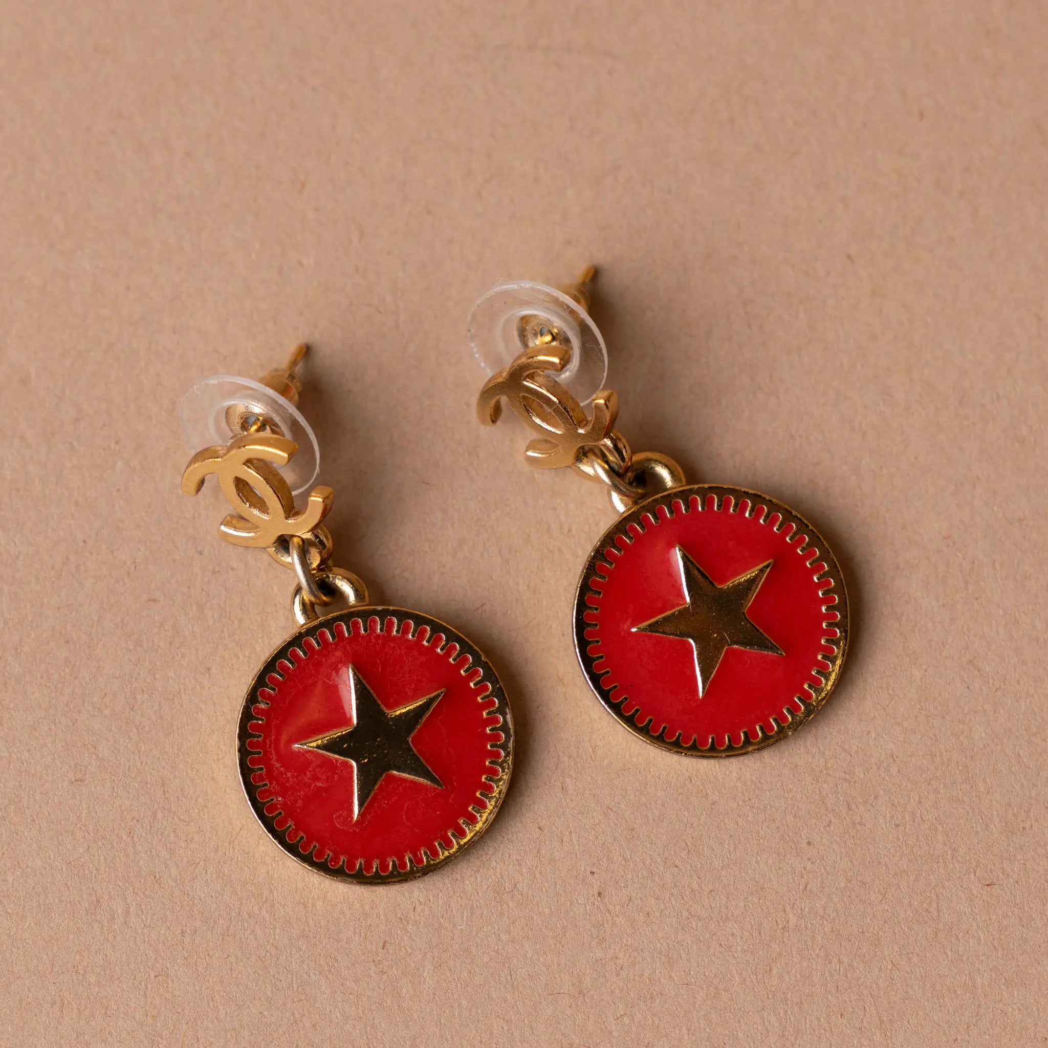 Chanel CC Gold Plated Enamel Star Dangling Push Back Earrings — Side Profile