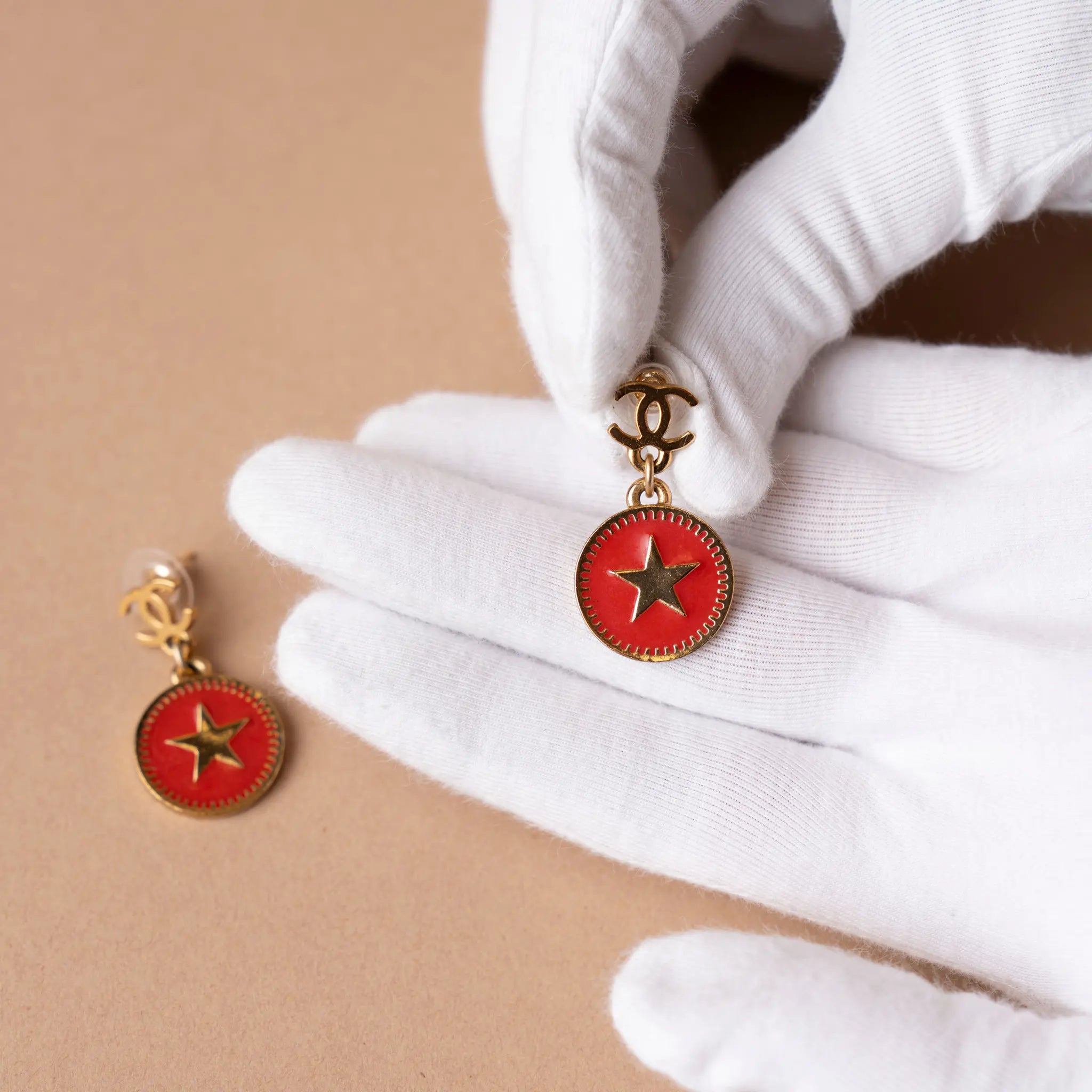 Chanel CC Gold Plated Enamel Star Dangling Push Back Earrings — Interior Detail