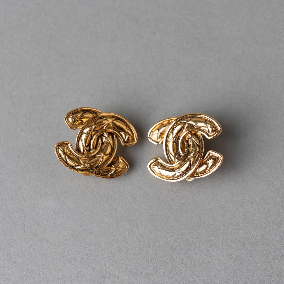 Chanel CC Gold Plated Quilted Clip On Earrings — Featured Image