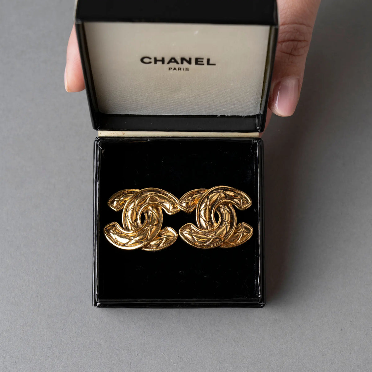 Chanel CC Gold Plated Quilted Clip On Earrings — Side Profile
