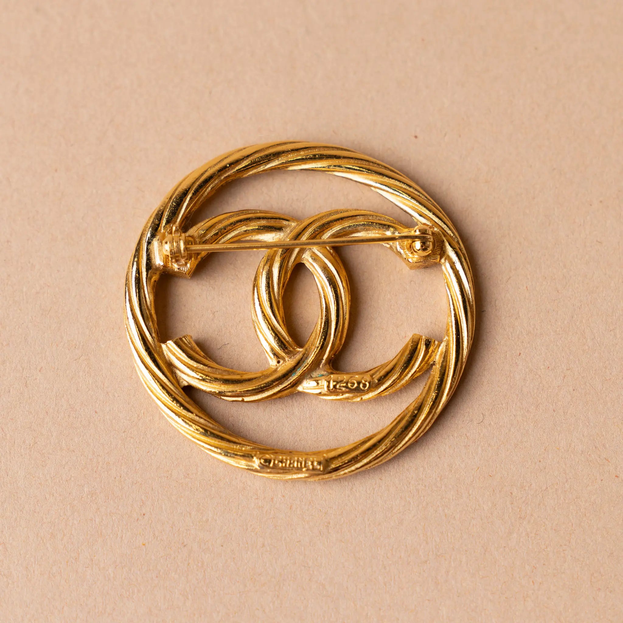 Chanel CC Gold Plated Round Brooch — Front View
