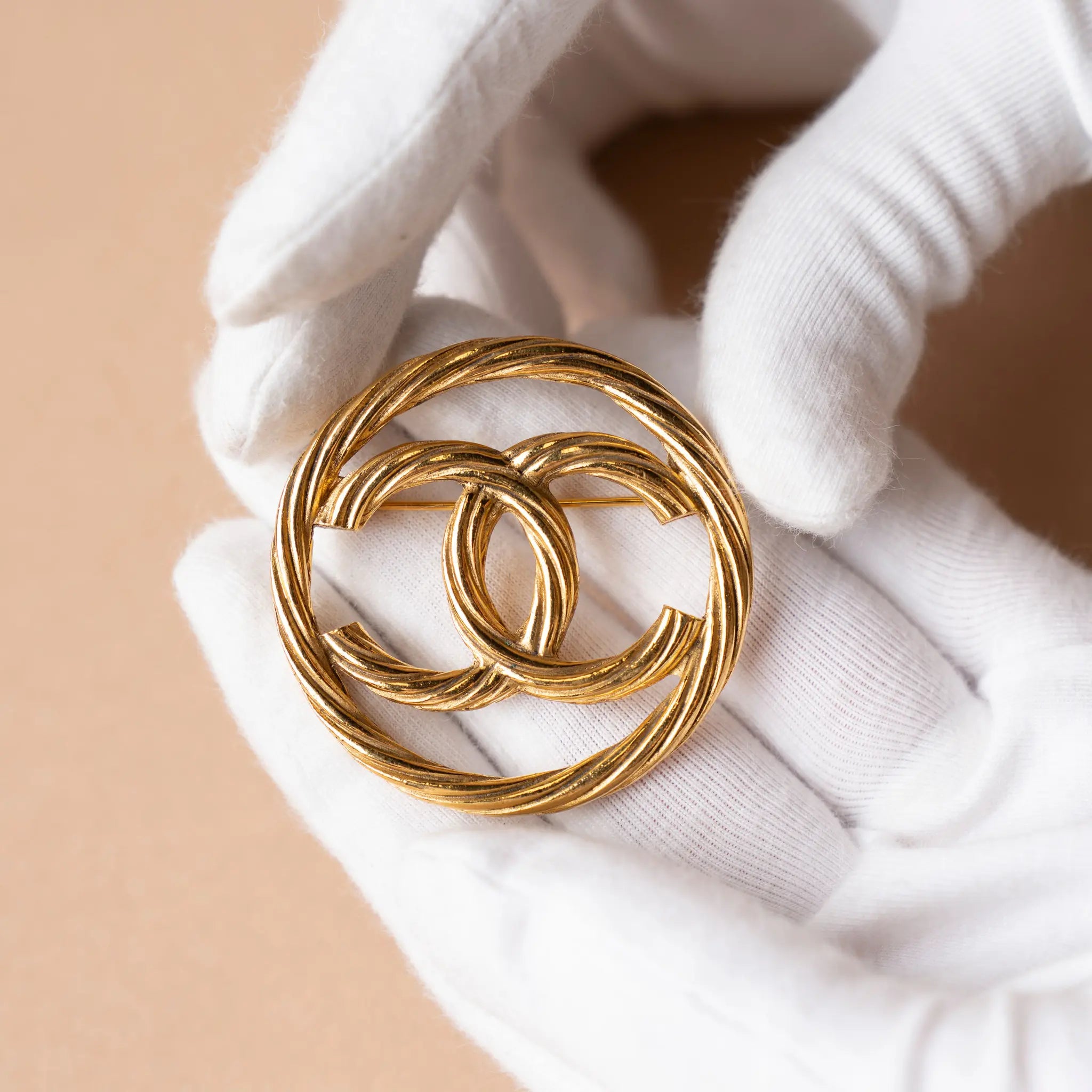 Chanel CC Gold Plated Round Brooch — Side Profile