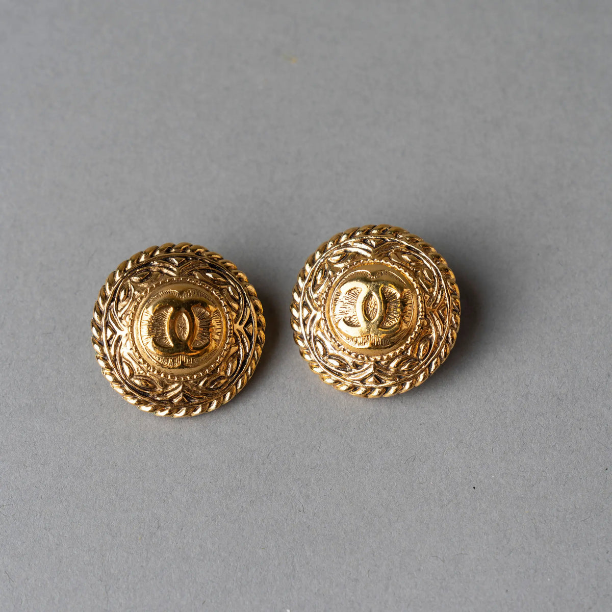 Chanel CC Gold Plated Round Clip On Earrings — Front View