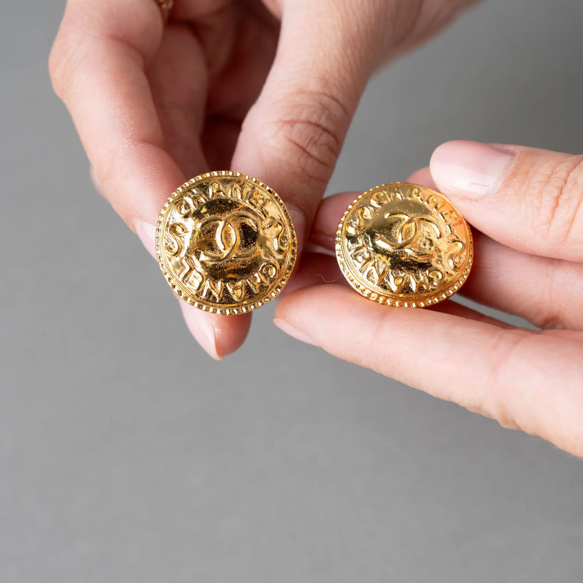 Chanel CC Gold Plated Round Clip On Earrings — Front View