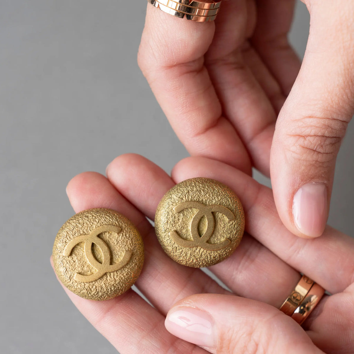 Chanel CC Gold Plated Round Clip On Earrings — Front View