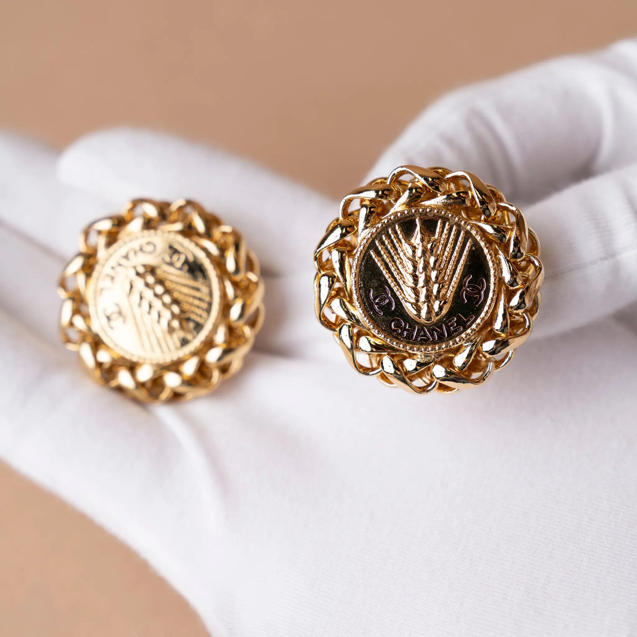 Chanel CC Gold Plated Wheat Medallion Clip On Earrings — Front View