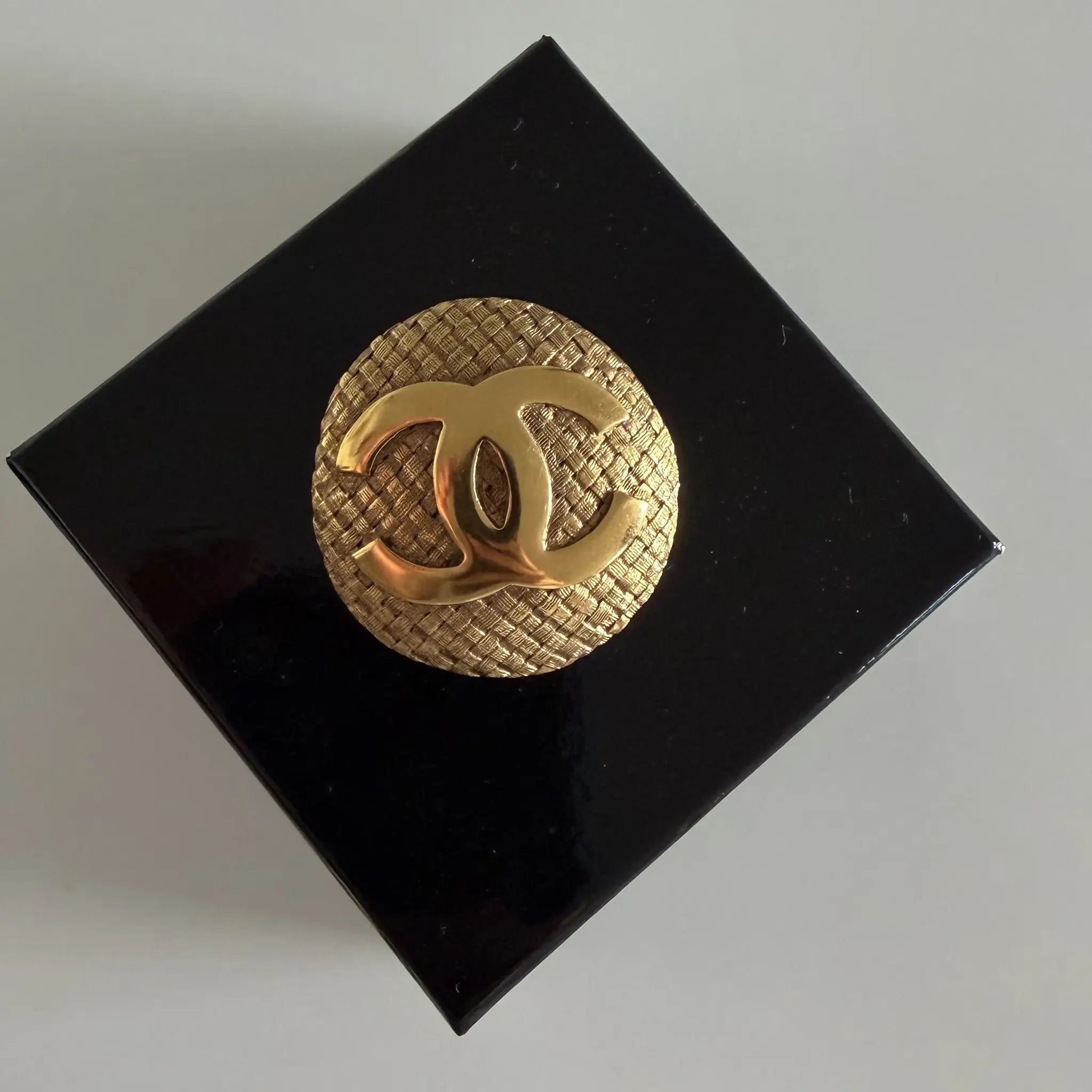 Chanel CC Gold Plated Woven Round Brooch — Close-up Detail