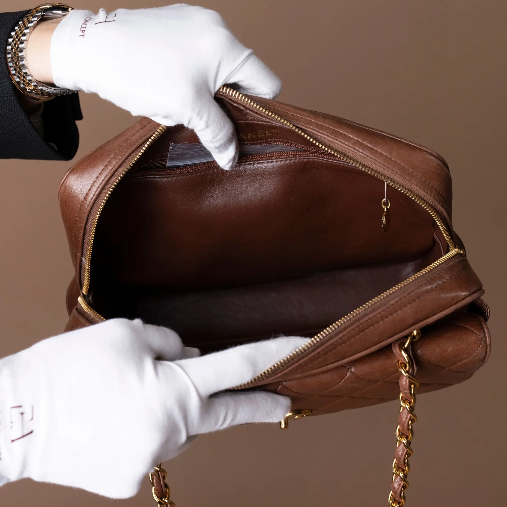 Chanel CC Quilted Lambskin Front Pocket Shoulder Bag — Side Profile