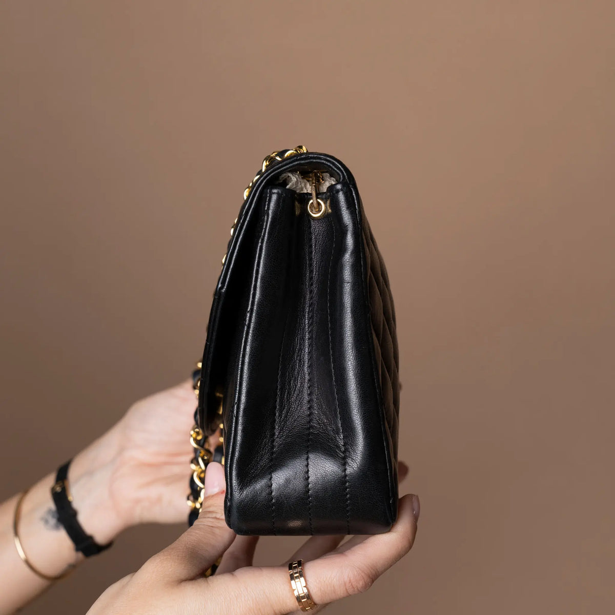 Chanel CC Quilted Lambskin Round Flap — Close-up Detail