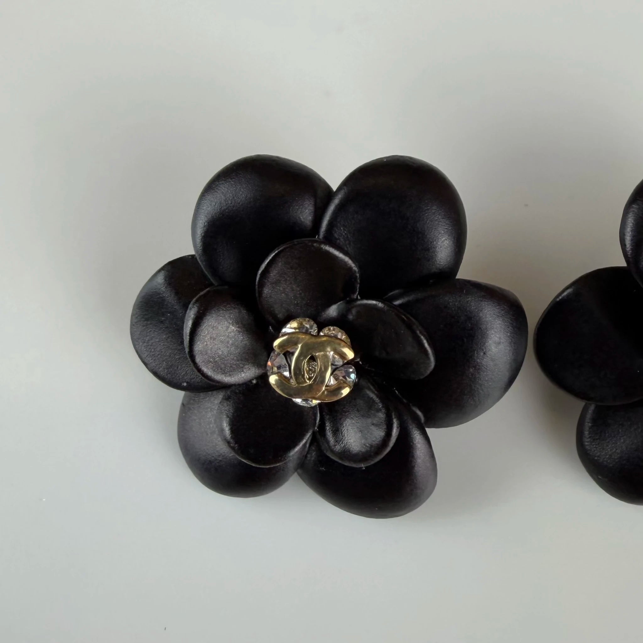 Chanel CC Resin Rhinestone Camellia Clip On Earrings