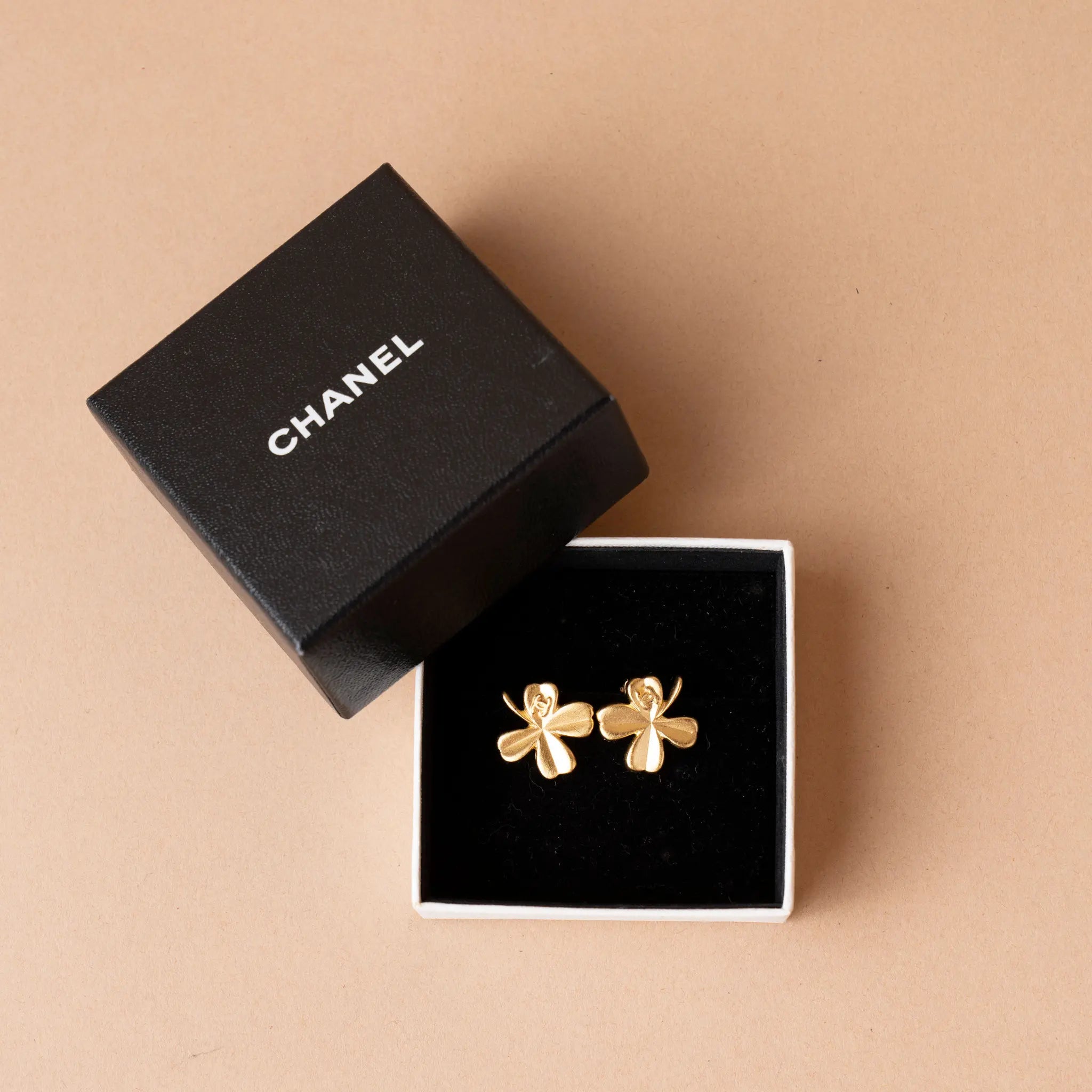 Chanel Gold Plated CC Clover Clip on Earrings — Front View