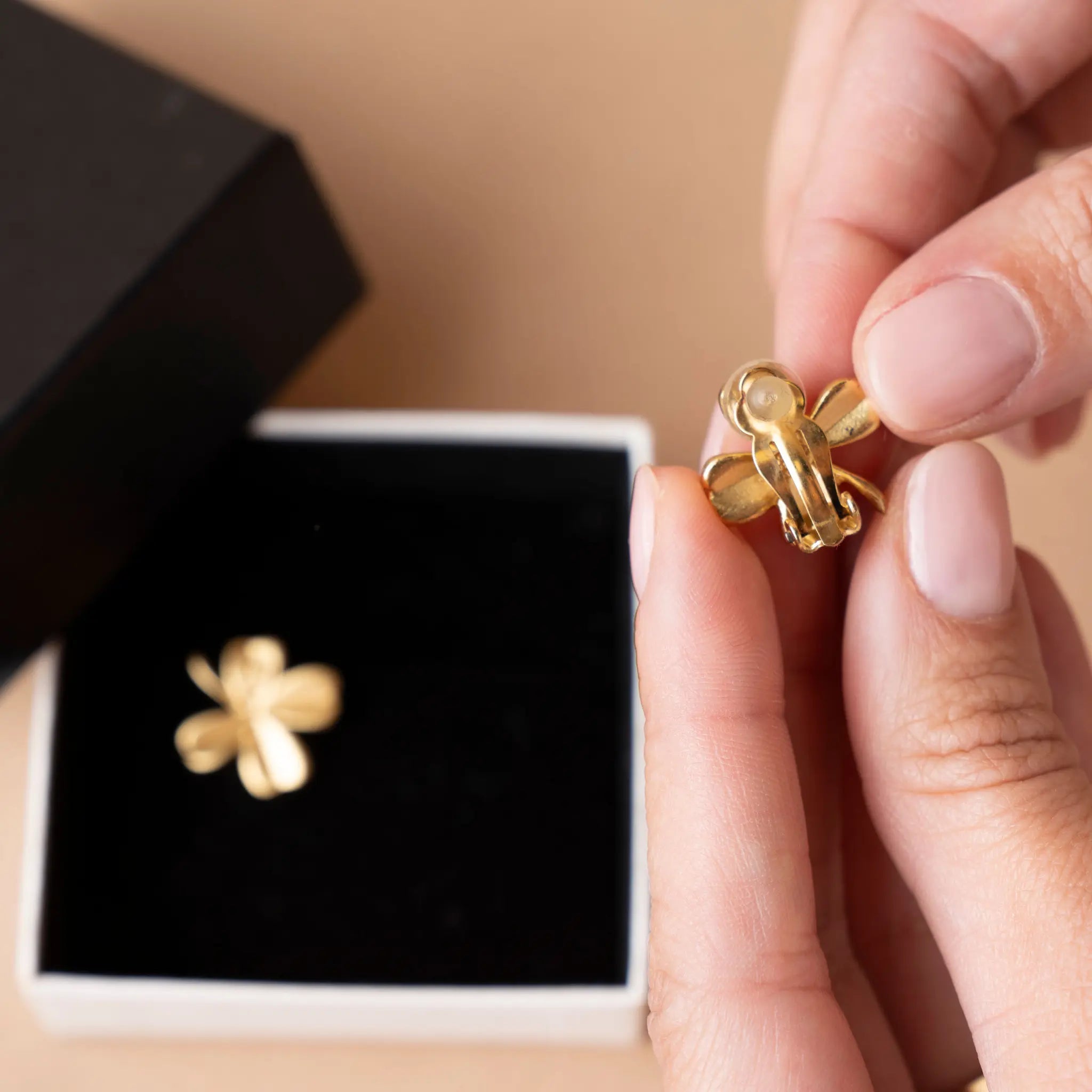 Chanel Gold Plated CC Clover Clip on Earrings — Side Profile