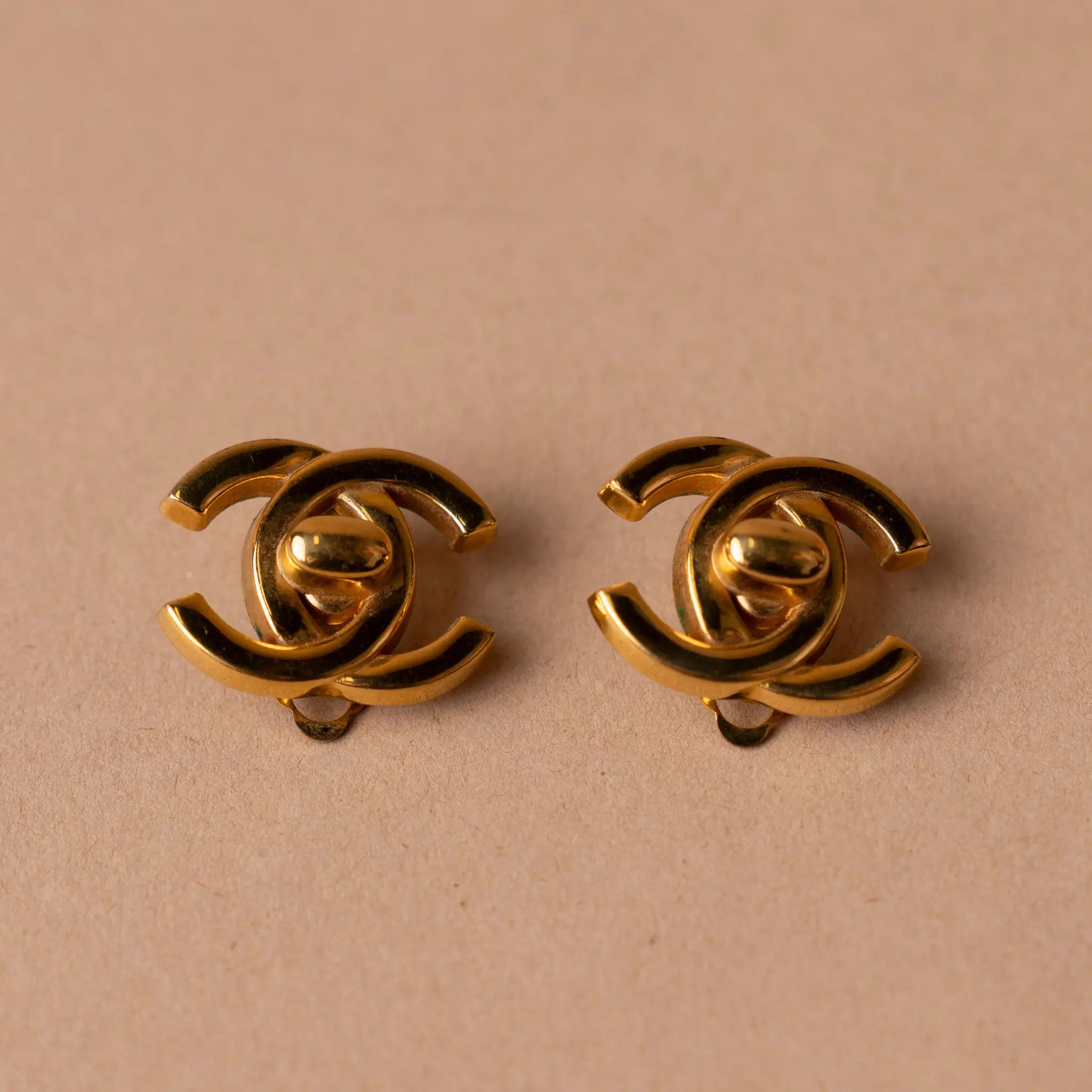 Chanel Gold Plated CC Turnlock Clip On Earrings — Front View