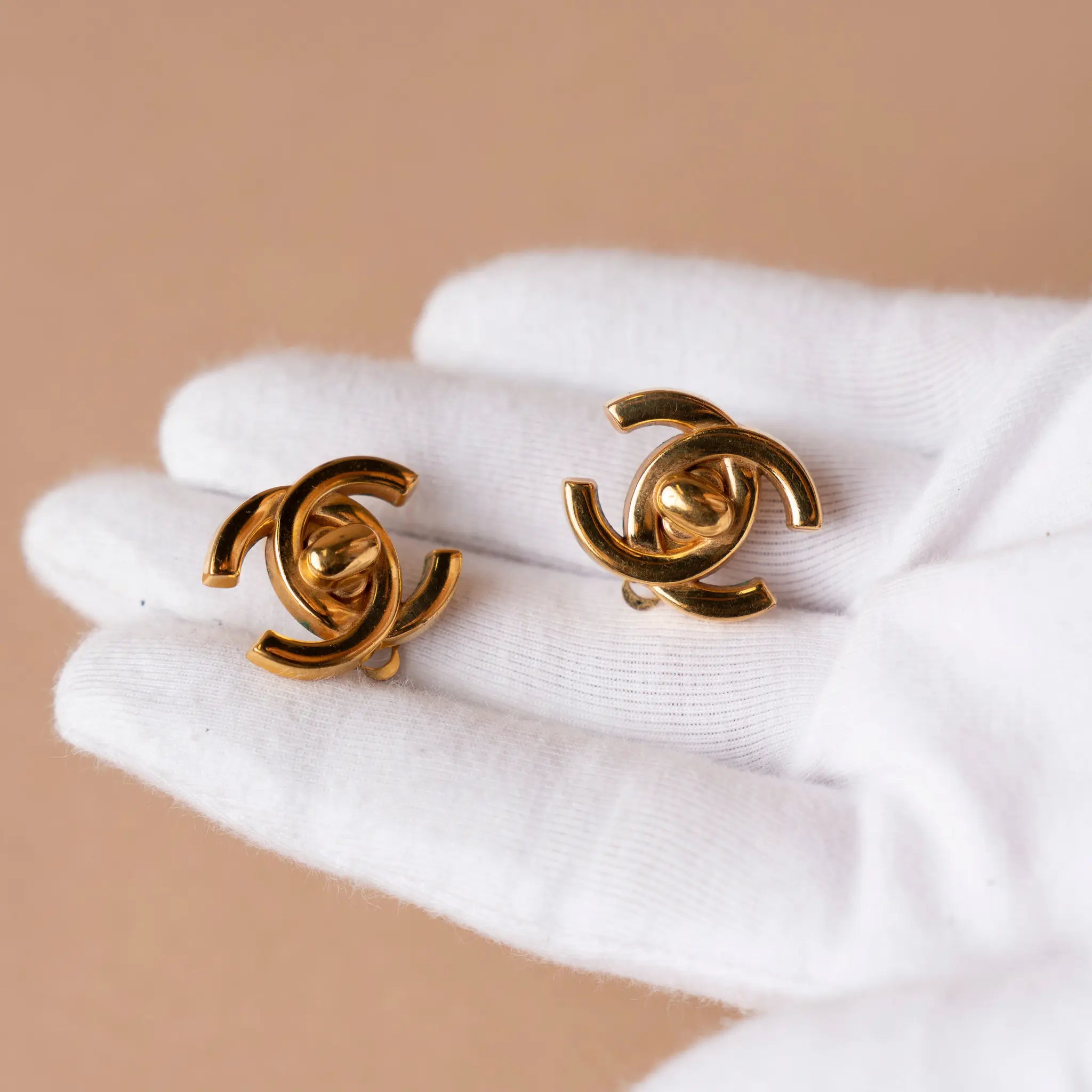 Chanel Gold Plated CC Turnlock Clip On Earrings — Side Profile