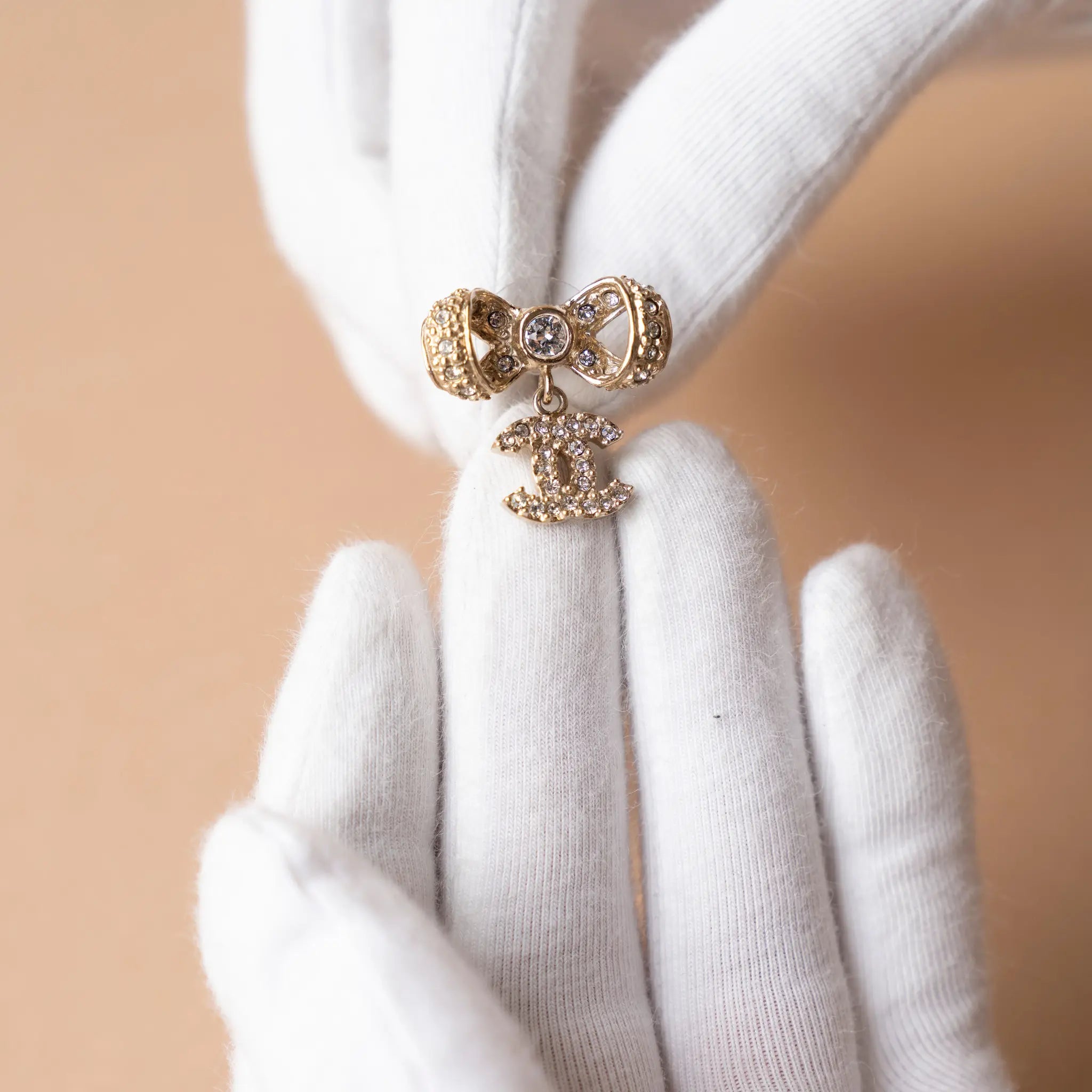 Chanel Gold Plated Rhinestones CC Bow Earings — Front View