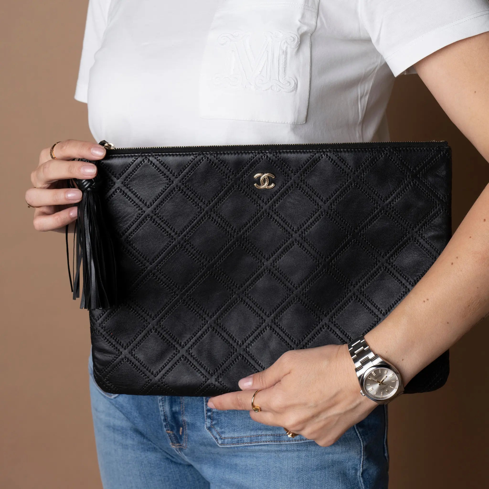 Chanel Large Quilted Lambskin Double Stitch Tassel O Case Clutch — Side Profile