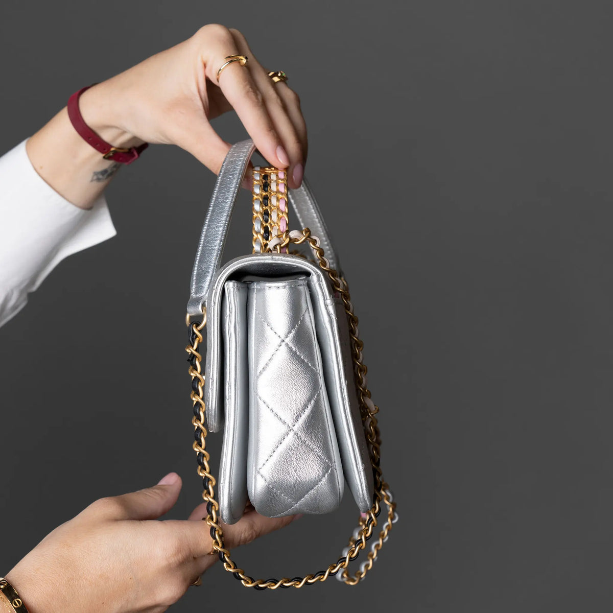 Chanel Mini Metallic Lambskin Top Handle Flap — Close-up Detail