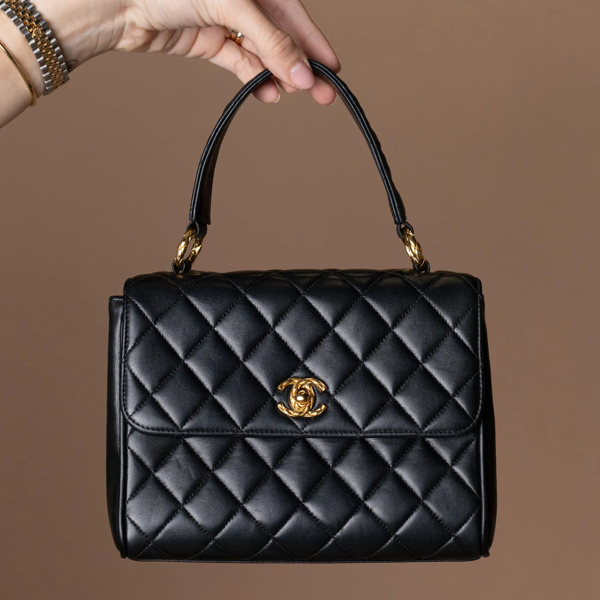 Chanel Mini Quilted Lambskin Kelly Top Handle Bag — Featured Image