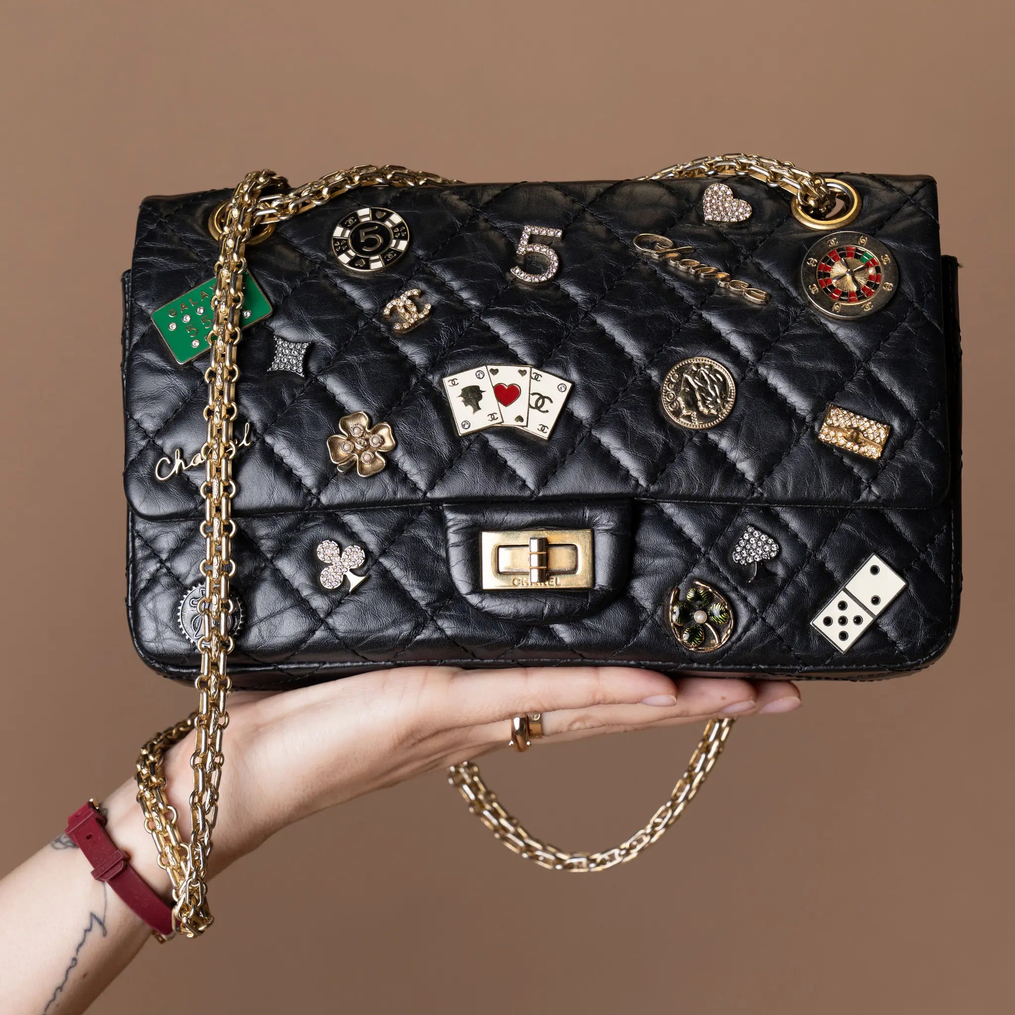 Chanel Quilted Aged Calfskin Reissue 2.55 Lucky Charms Double Flap 225 — Detail View