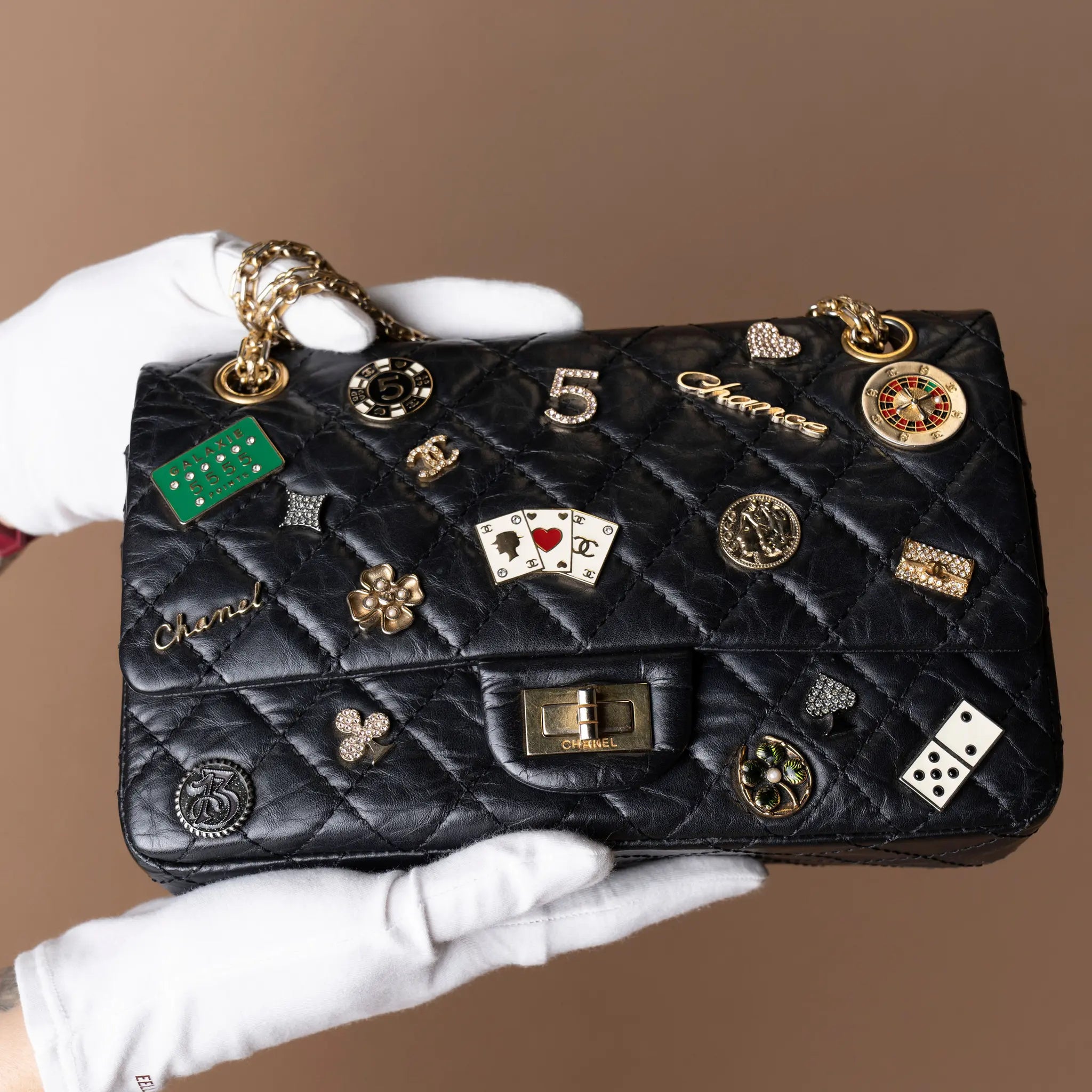 Chanel Quilted Aged Calfskin Reissue 2.55 Lucky Charms Double Flap 225 — Detail View