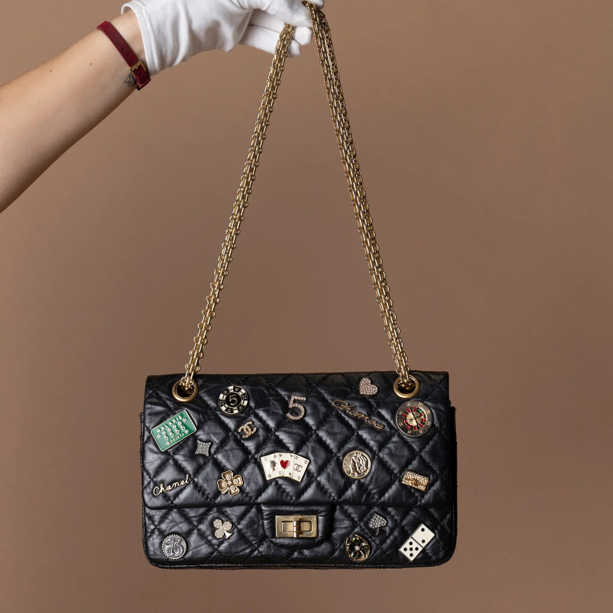 Chanel Quilted Aged Calfskin Reissue 2.55 Lucky Charms Double Flap 225 — Detail View