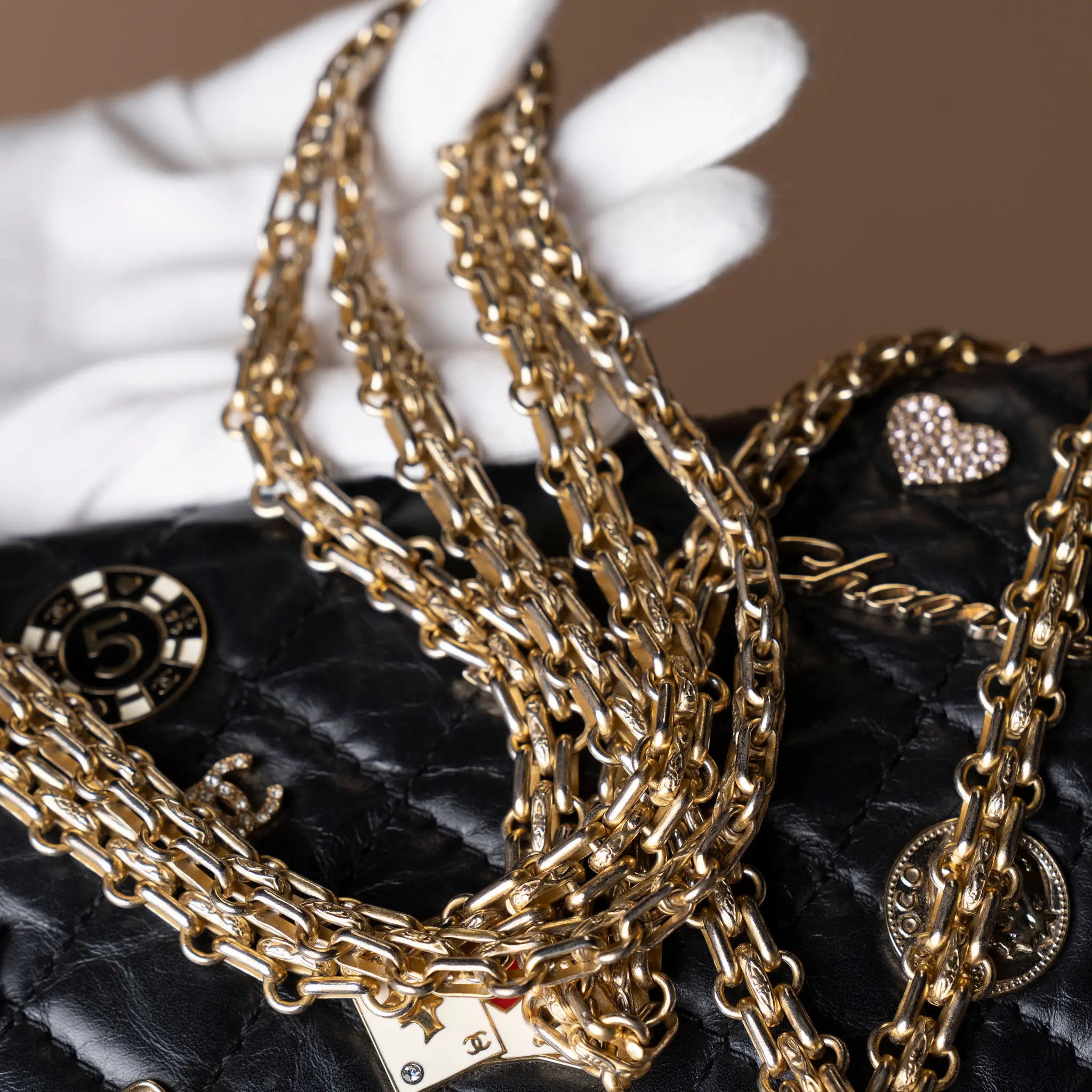 Chanel Quilted Aged Calfskin Reissue 2.55 Lucky Charms Double Flap 225 — Detail View