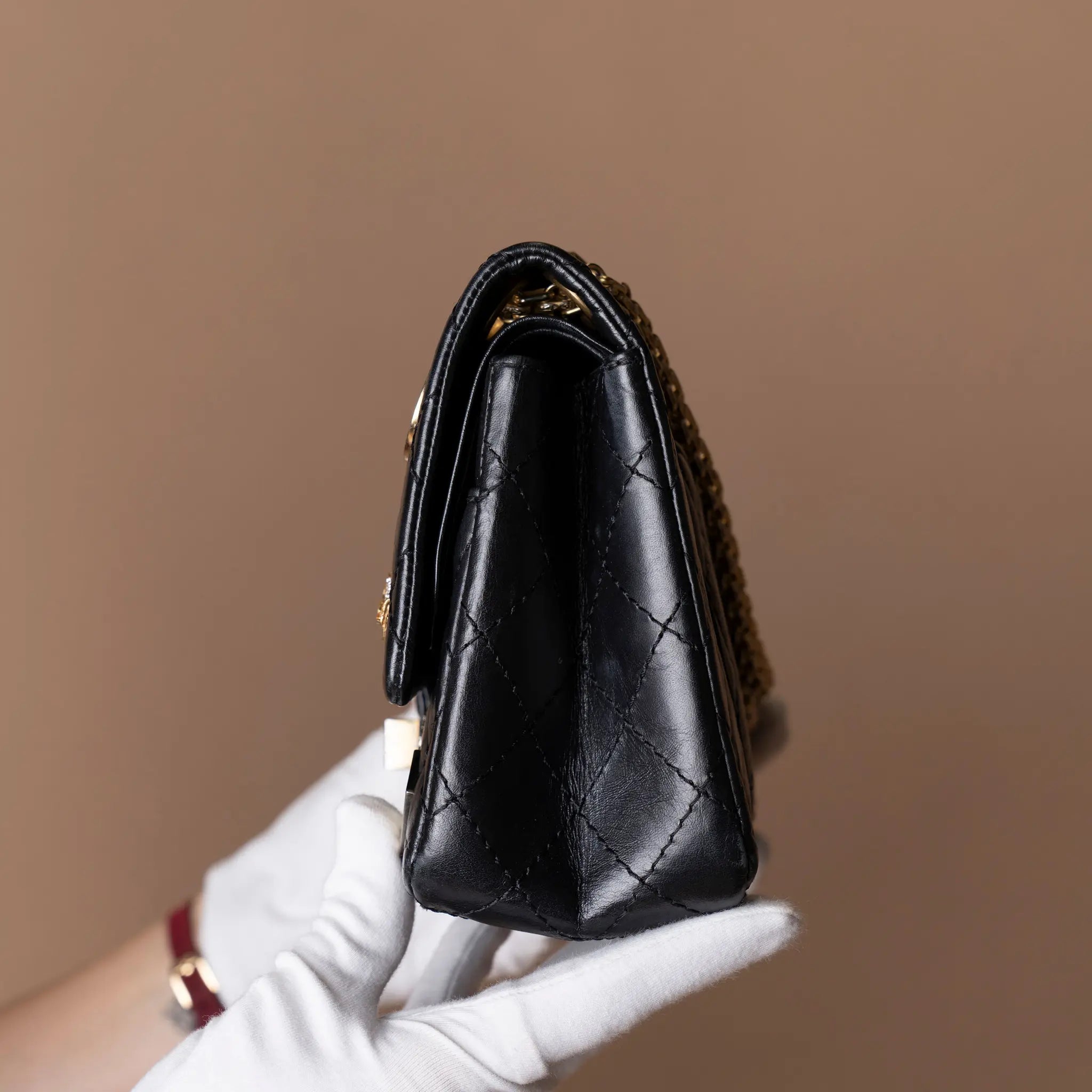 Chanel Quilted Aged Calfskin Reissue 2.55 Lucky Charms Double Flap 225 — Detail View