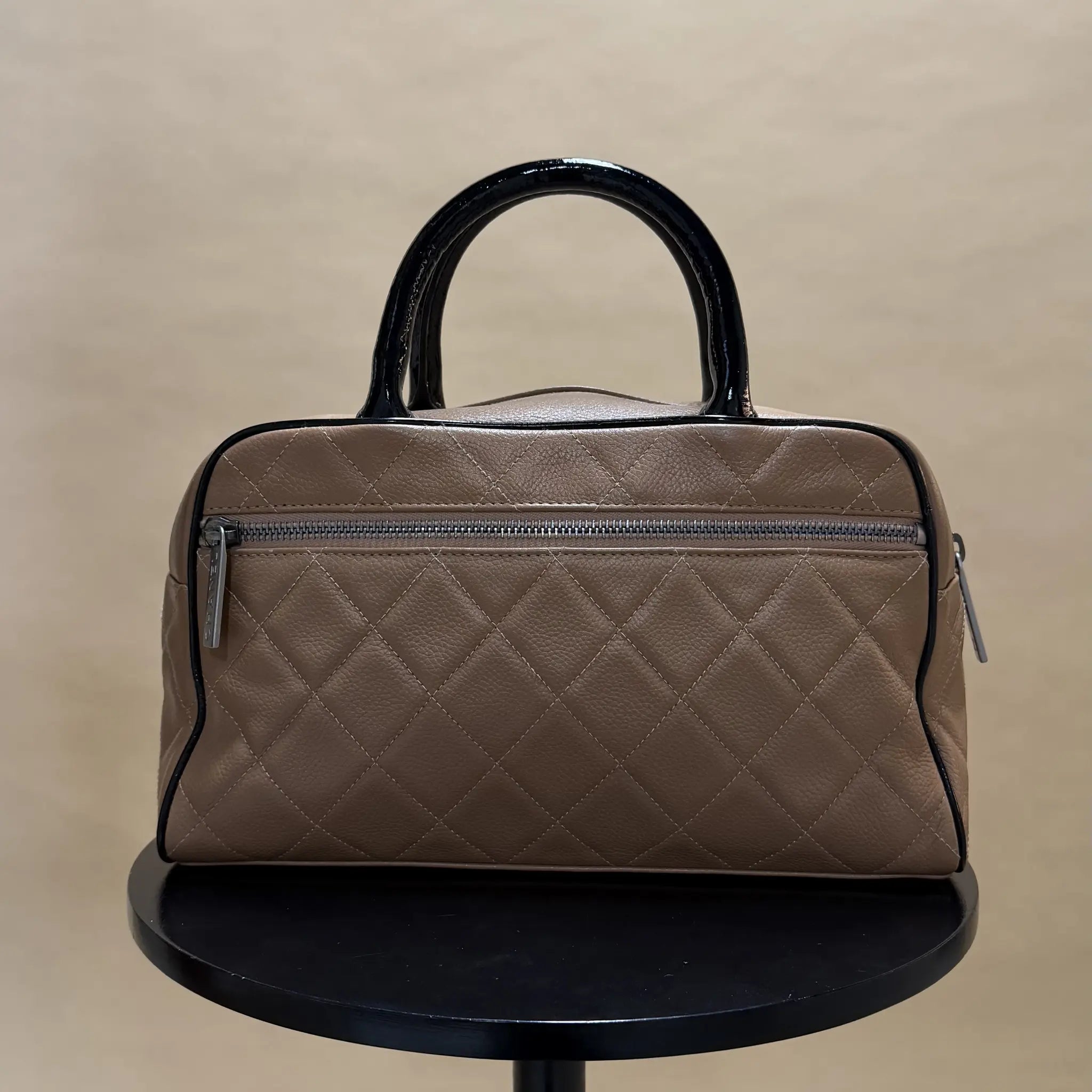 Chanel Quilted Caviar Bowler Handbag — Side Profile