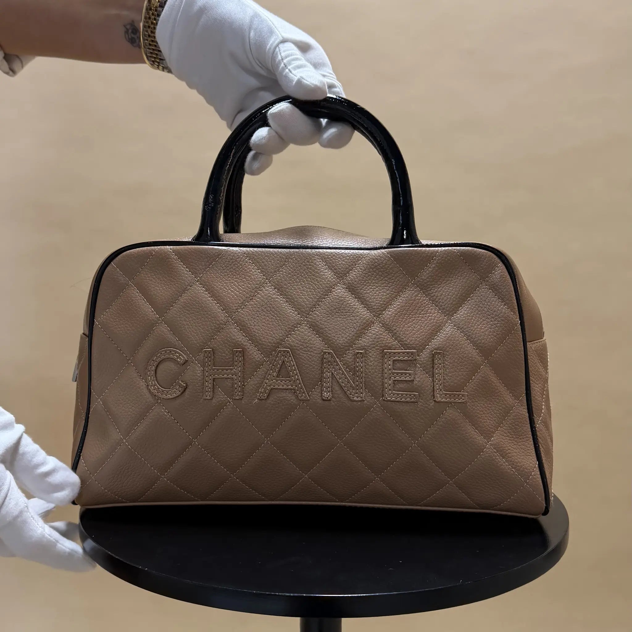Chanel Quilted Caviar Bowler Handbag — Close-up Detail