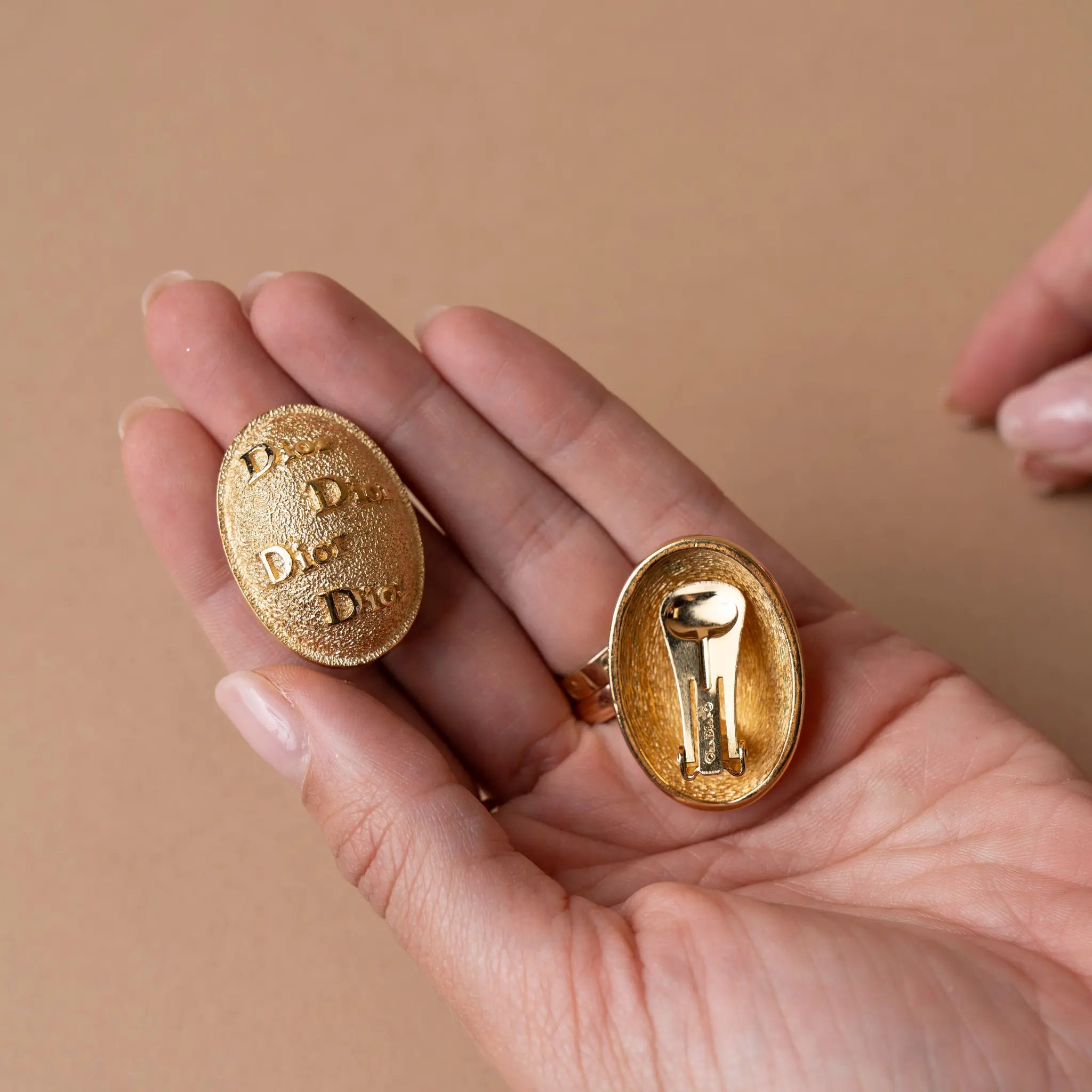 Dior Gold Plated Oval Logo Clip On Earrings — Front View
