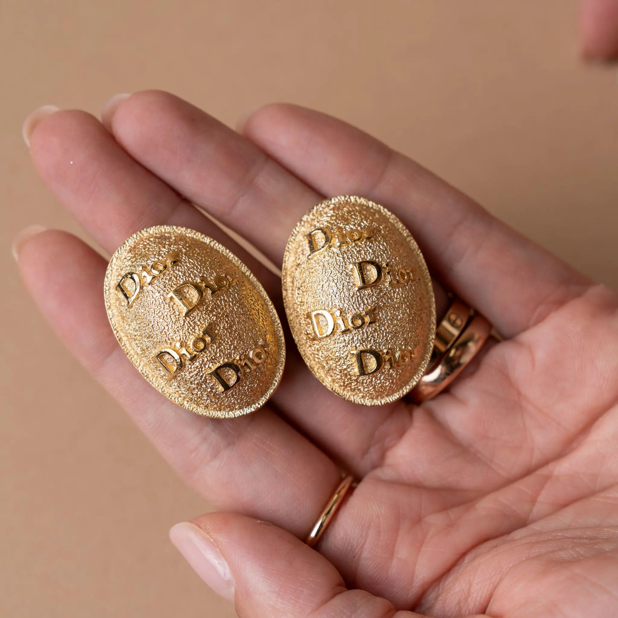 Dior Gold Plated Oval Logo Clip On Earrings — Side Profile