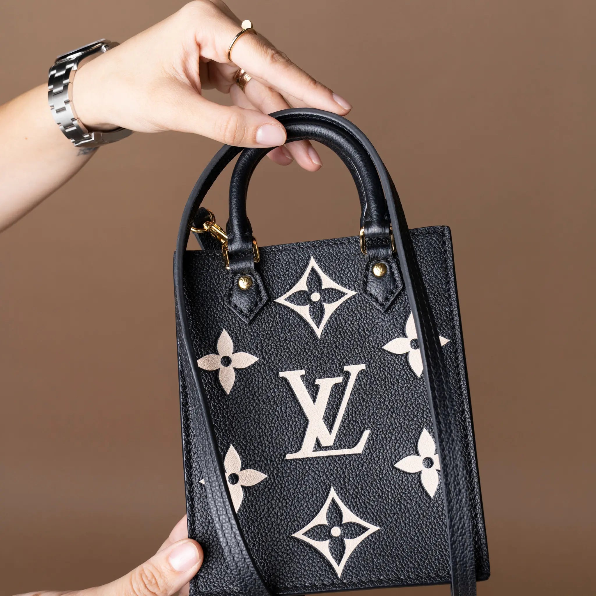Louis Vuitton Bicolor Monogram Empreinte Petit Sac Plat — Close-up Detail