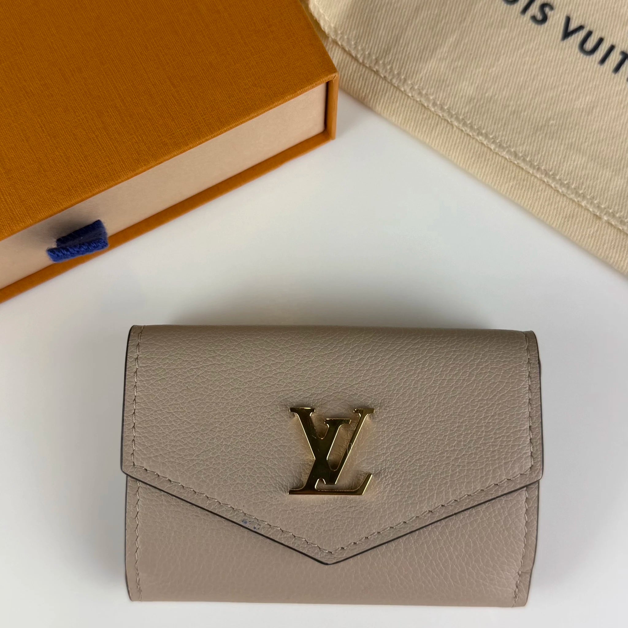 Louis Vuitton Leather Lockmini Wallet