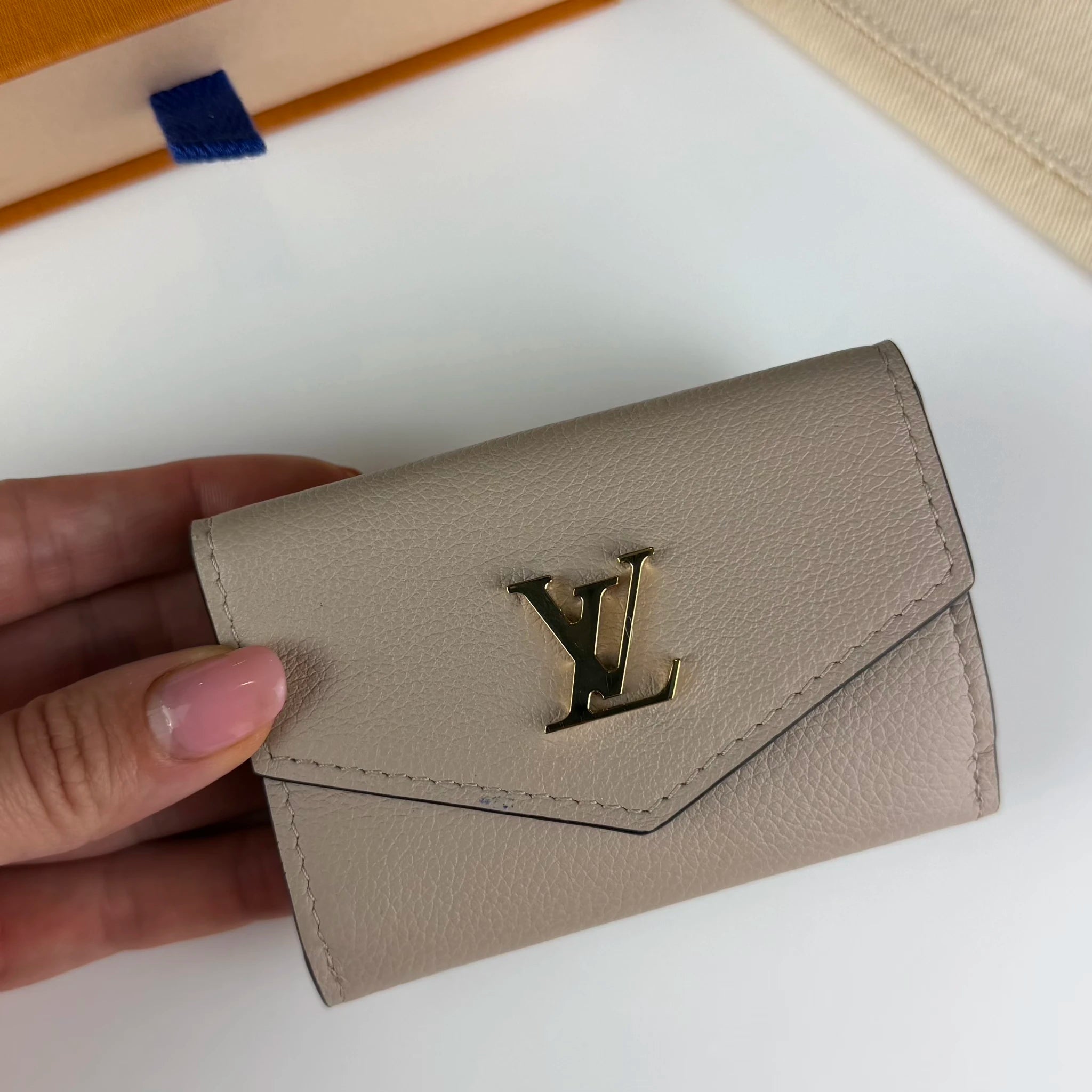 Louis Vuitton Leather Lockmini Wallet