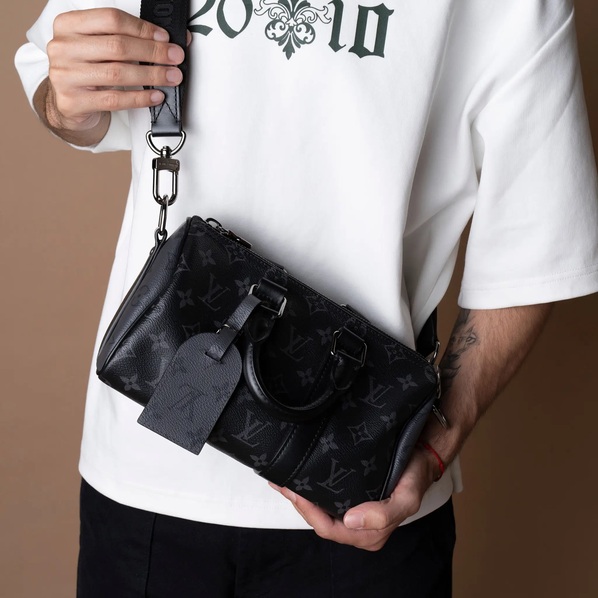 Louis Vuitton Monogram Eclipse Reverse Keepall Bandouliere 25 — Front View