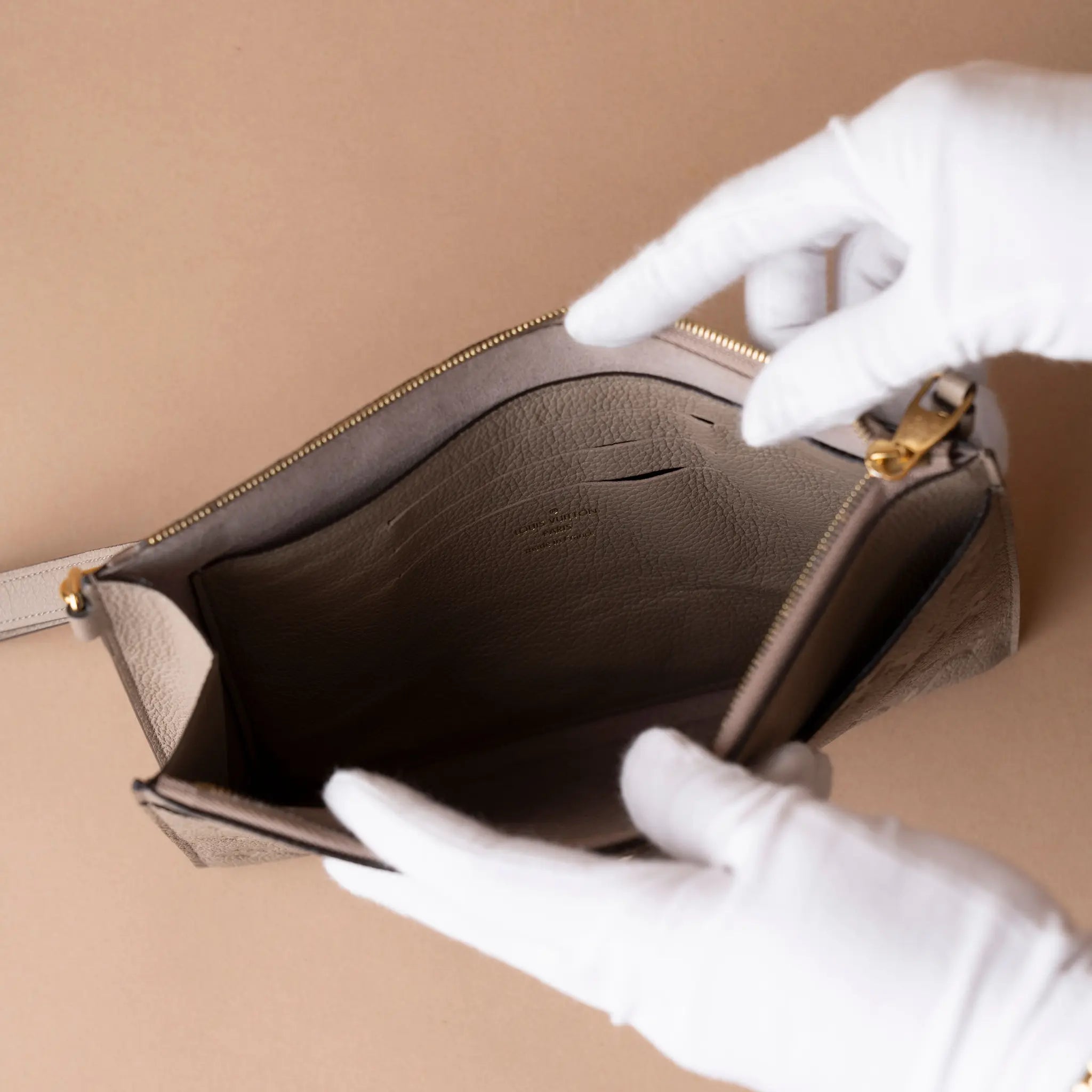 Louis Vuitton Monogram Empreinte Daily Pouch — Side Profile