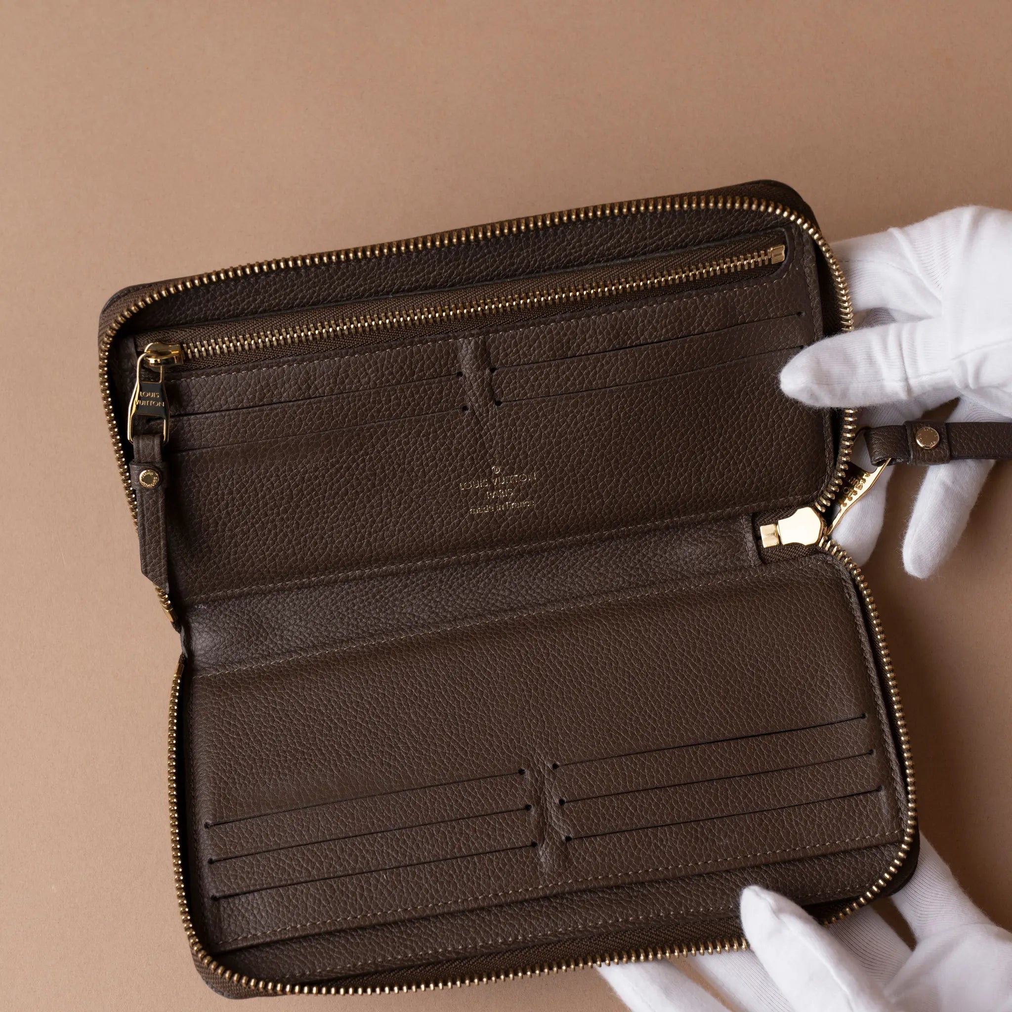 Louis Vuitton Monogram Empreinte Zippy Wallet — Front View