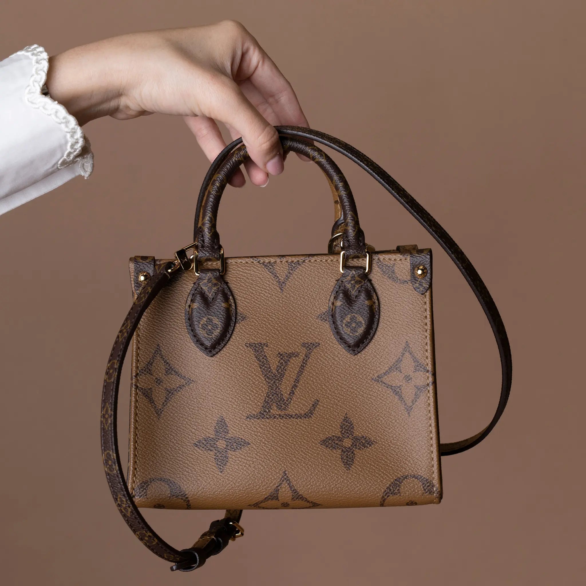 Louis Vuitton Monogram Reverse OnTheGo BB — Front View