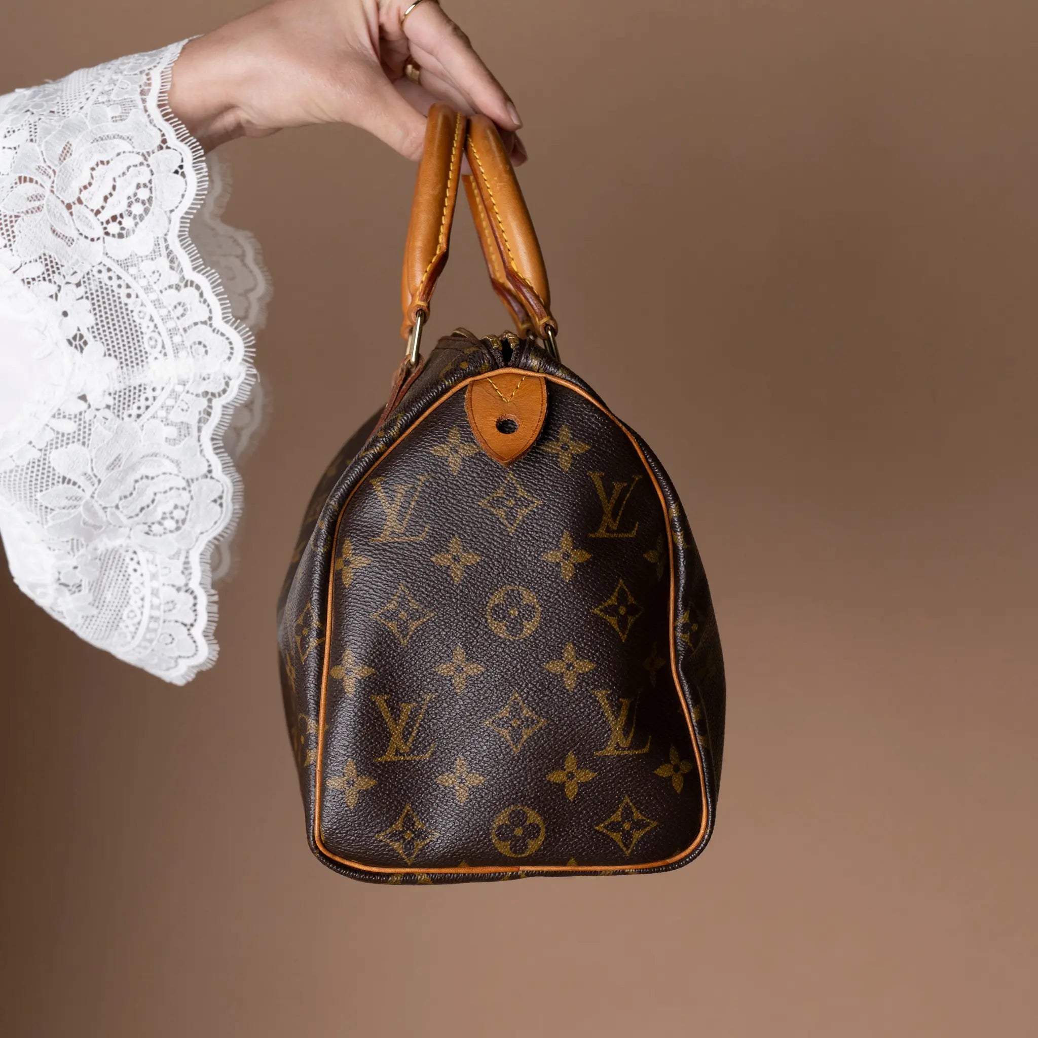 Louis Vuitton Monogram Speedy 25 — Front View