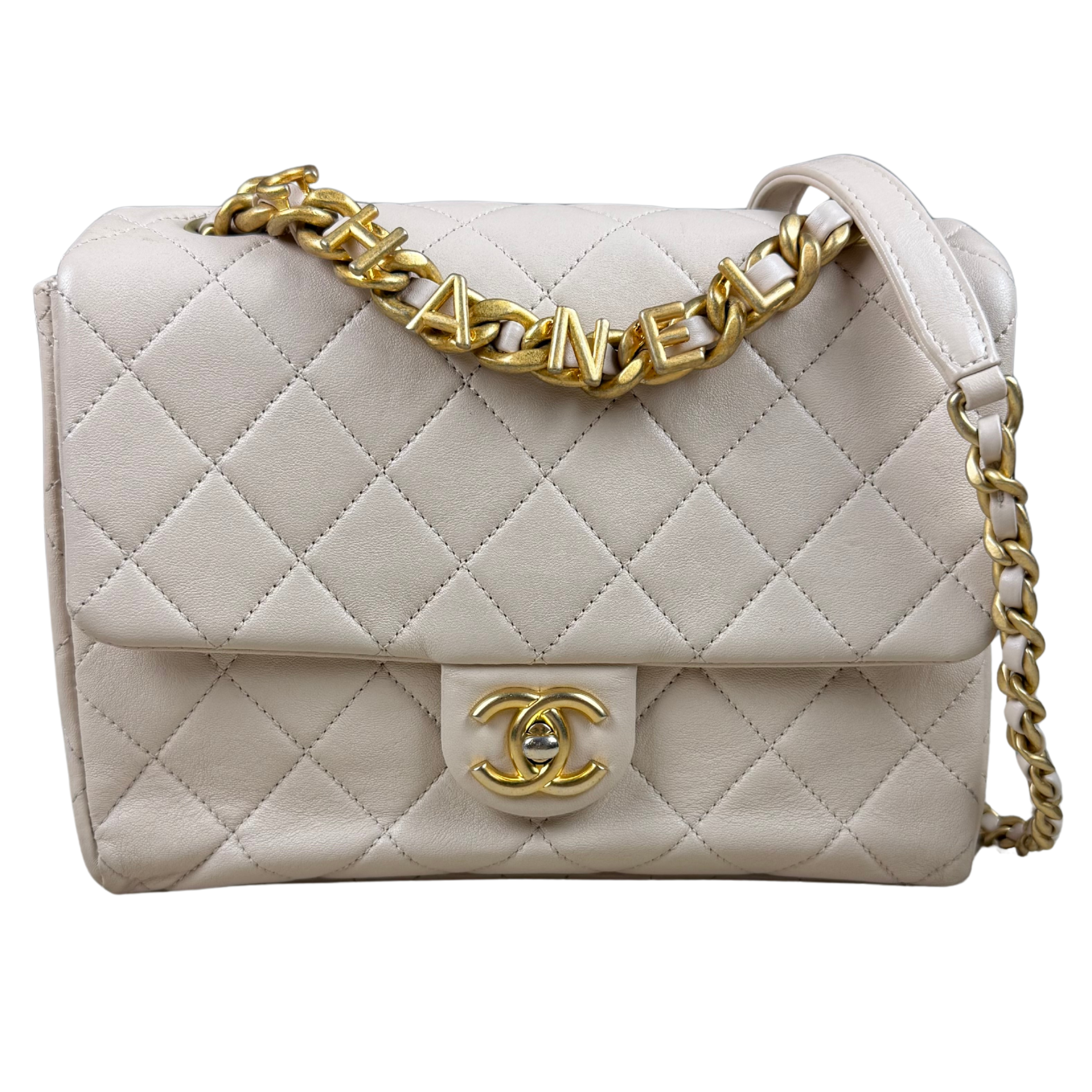 Chanel logo letters flap bag