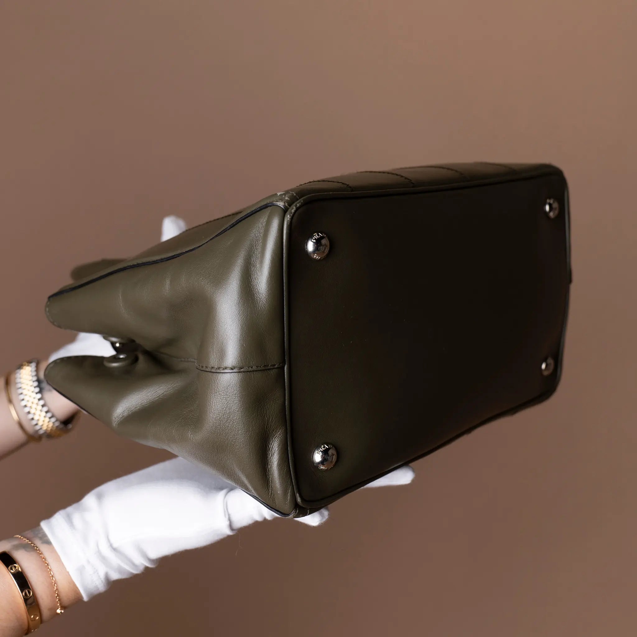 Prada Vitello Daino Vertical Stitched Top Handle Bag — Side Profile
