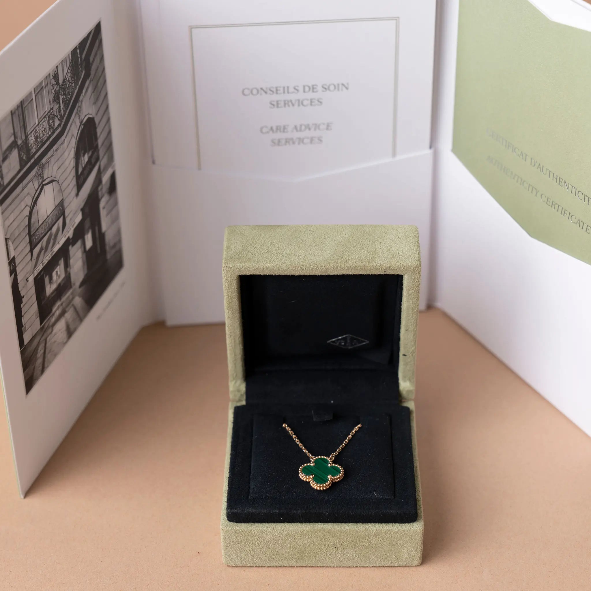 Van Cleef and Arpels 18K Yellow Gold and Malaquite Vintage Alhambra Pendant Necklace — Side Profile