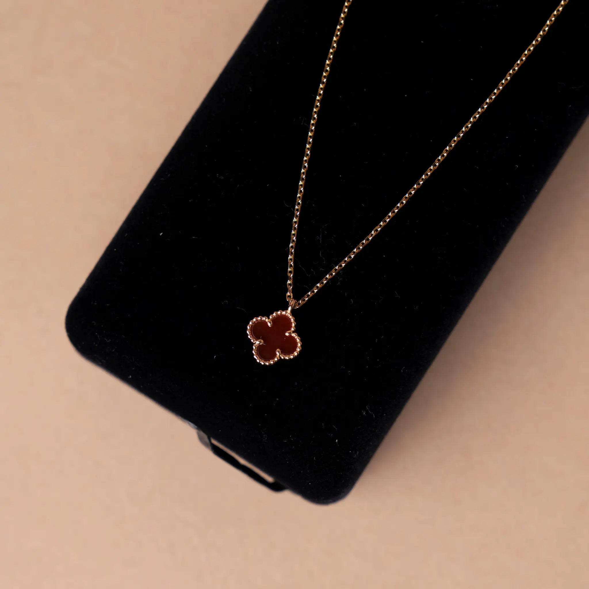Van Cleef and Arpels 18K Yellow Gold Carnelian Sweet Alhambra Pendant Necklace — Back View
