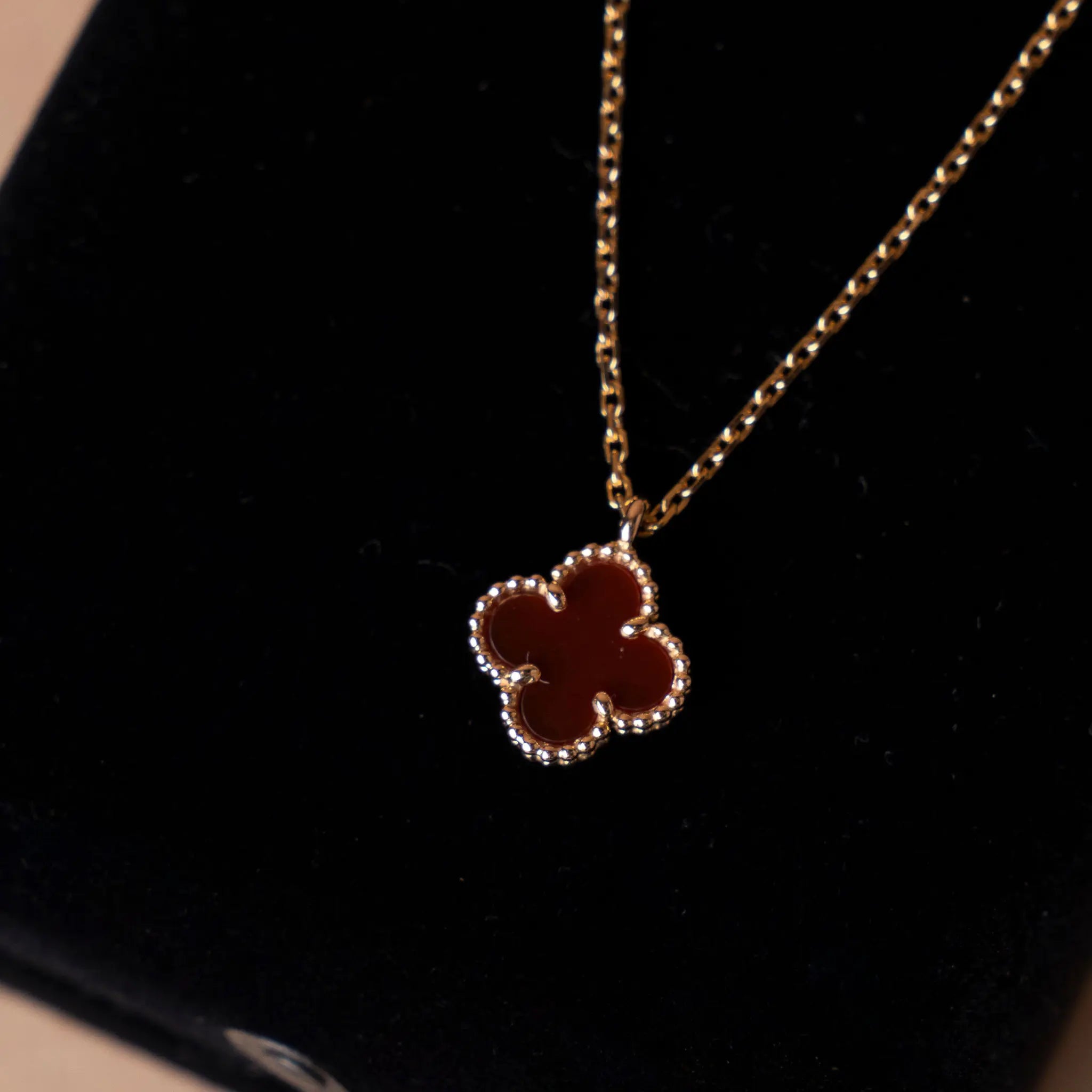 Van Cleef and Arpels 18K Yellow Gold Carnelian Sweet Alhambra Pendant Necklace — Side Profile